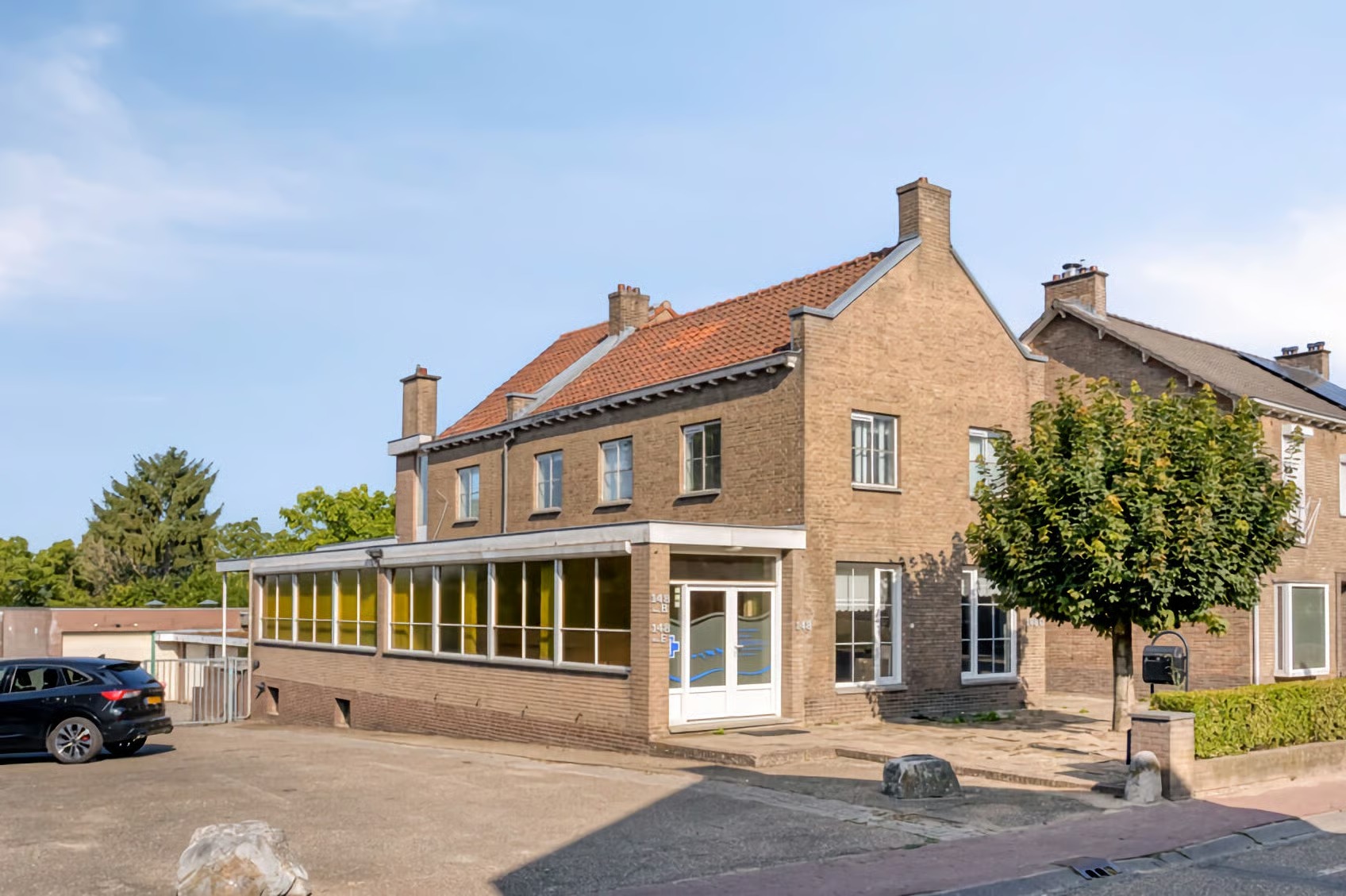 Vrijstaande woning (bedrijfs- of dienstwoning) Rijksweg 148 in Gronsveld