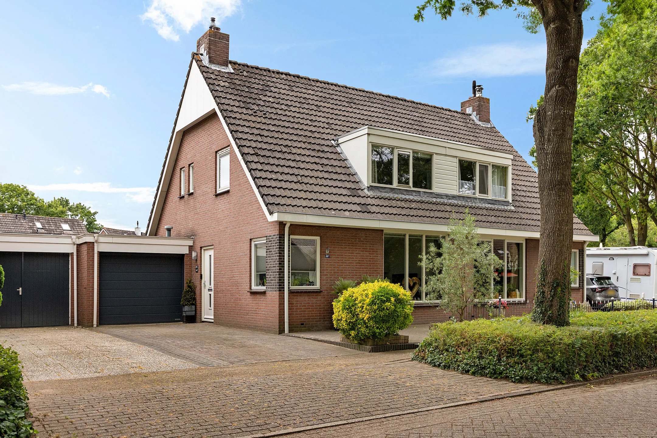 Geschakelde 2-onder-1-kapwoning Luchtenstein 36 a in de Wijk