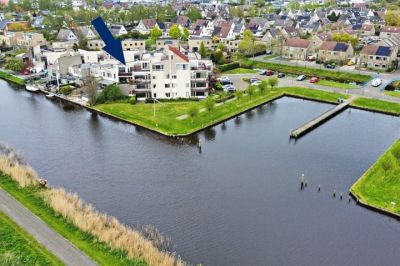 Portiekflat (appartement) it Rûm 21 in Heerenveen