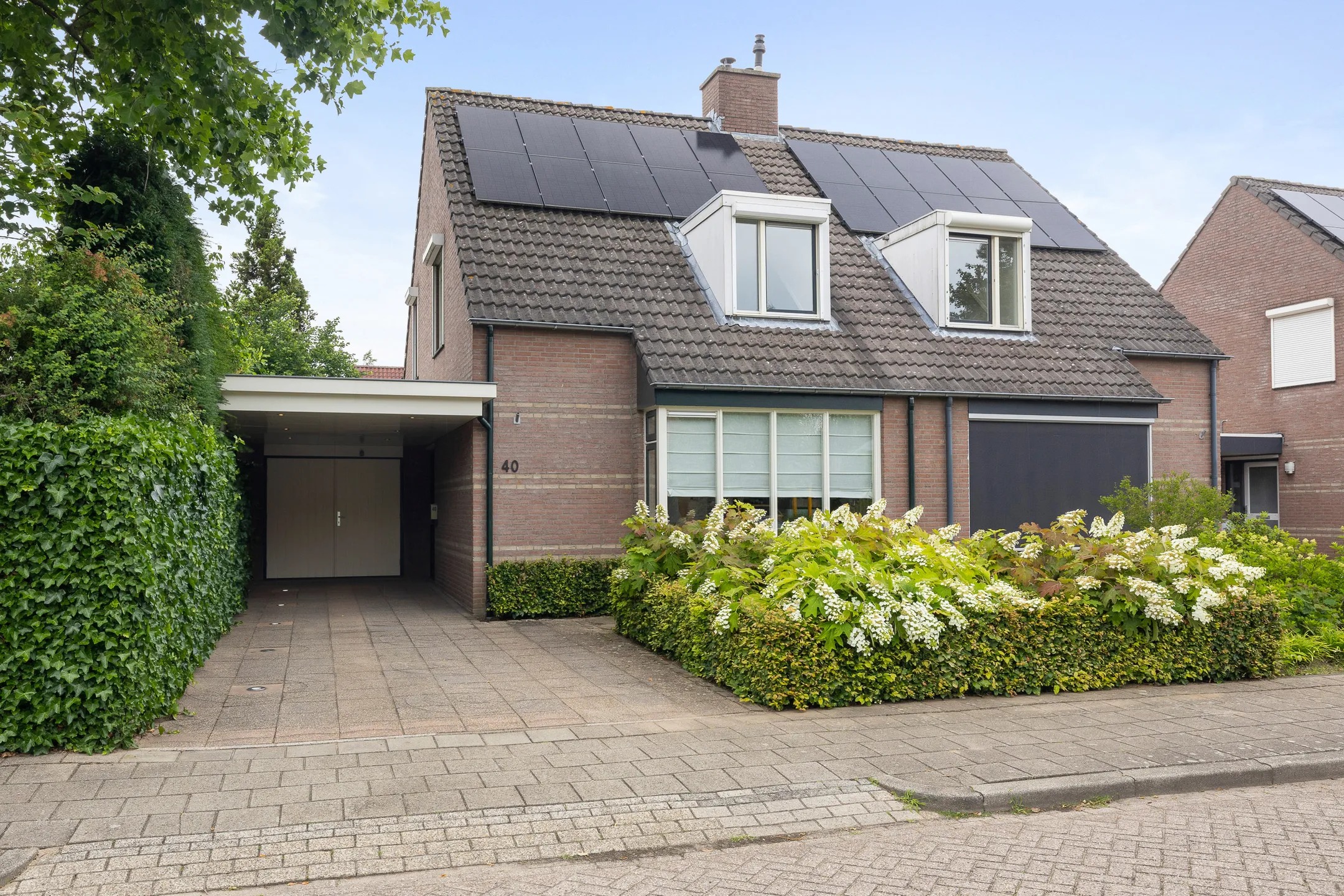 2-onder-1-kapwoning Korenbloem 40 in Helden
