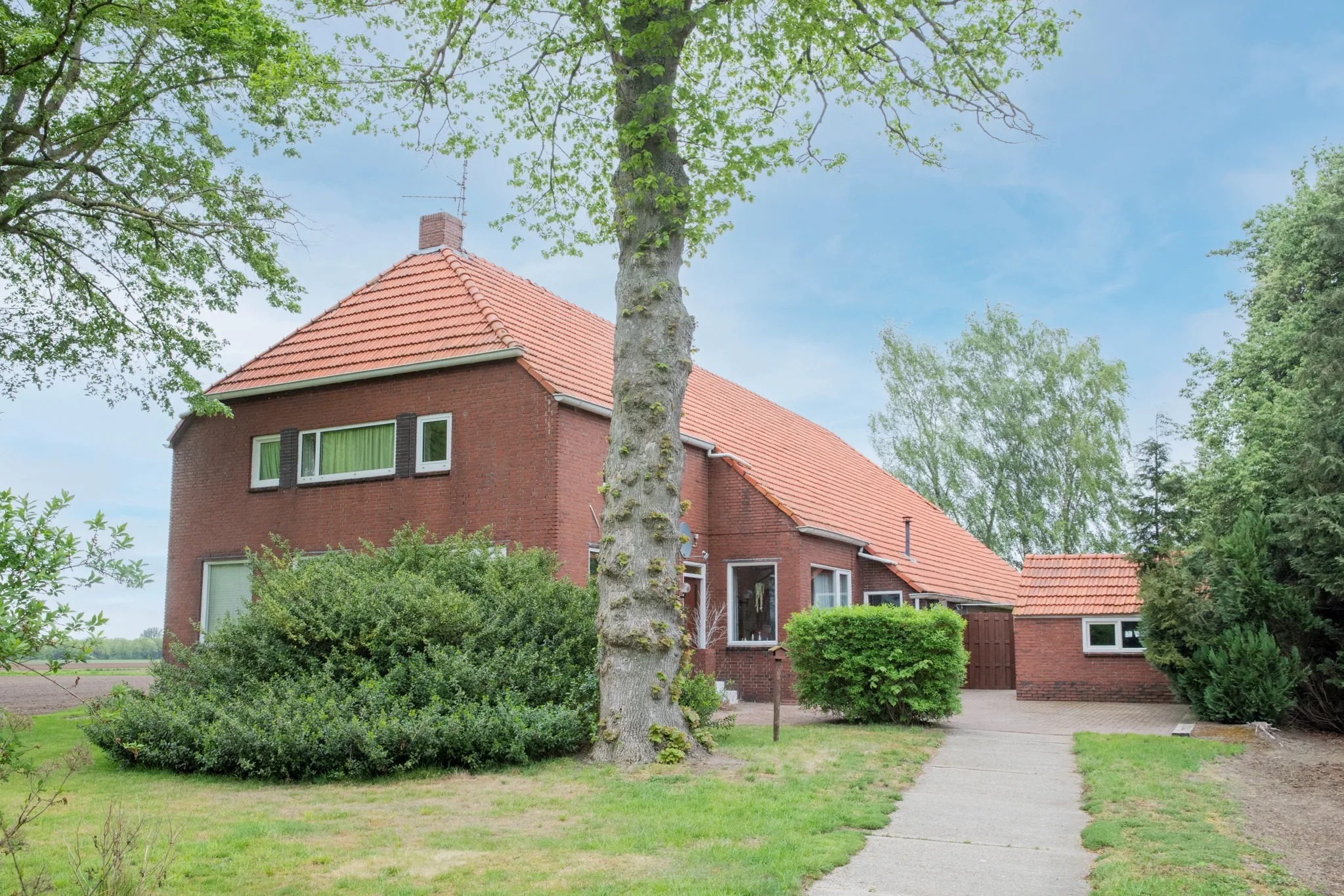 Vrijstaande woning (bedrijfs- of dienstwoning) Wedderstraat 84 in Vlagtwedde