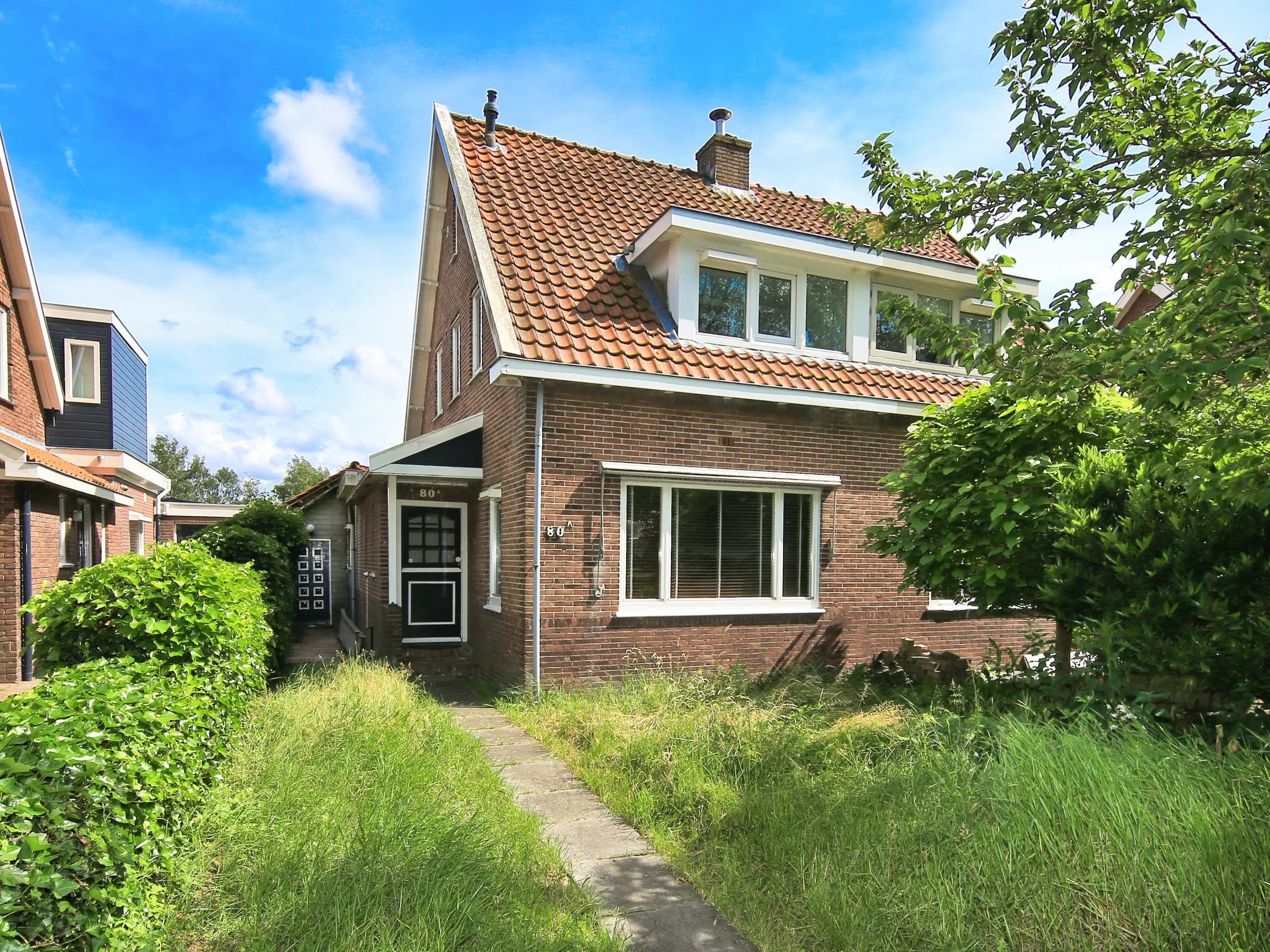 2-onder-1-kapwoning Hoofdweg 80 A in Lijnden