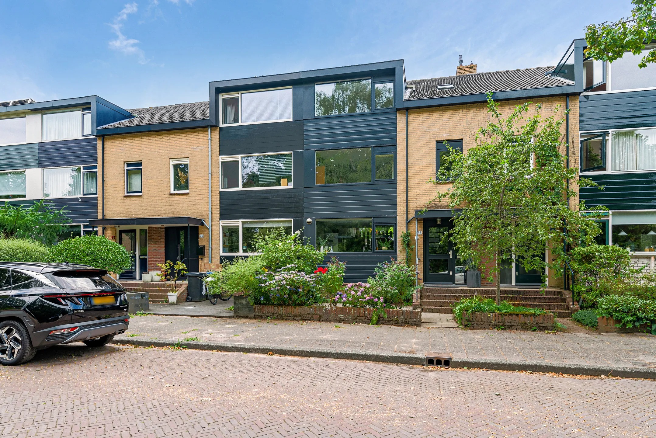 Tussenwoning Want 75 in Huizen