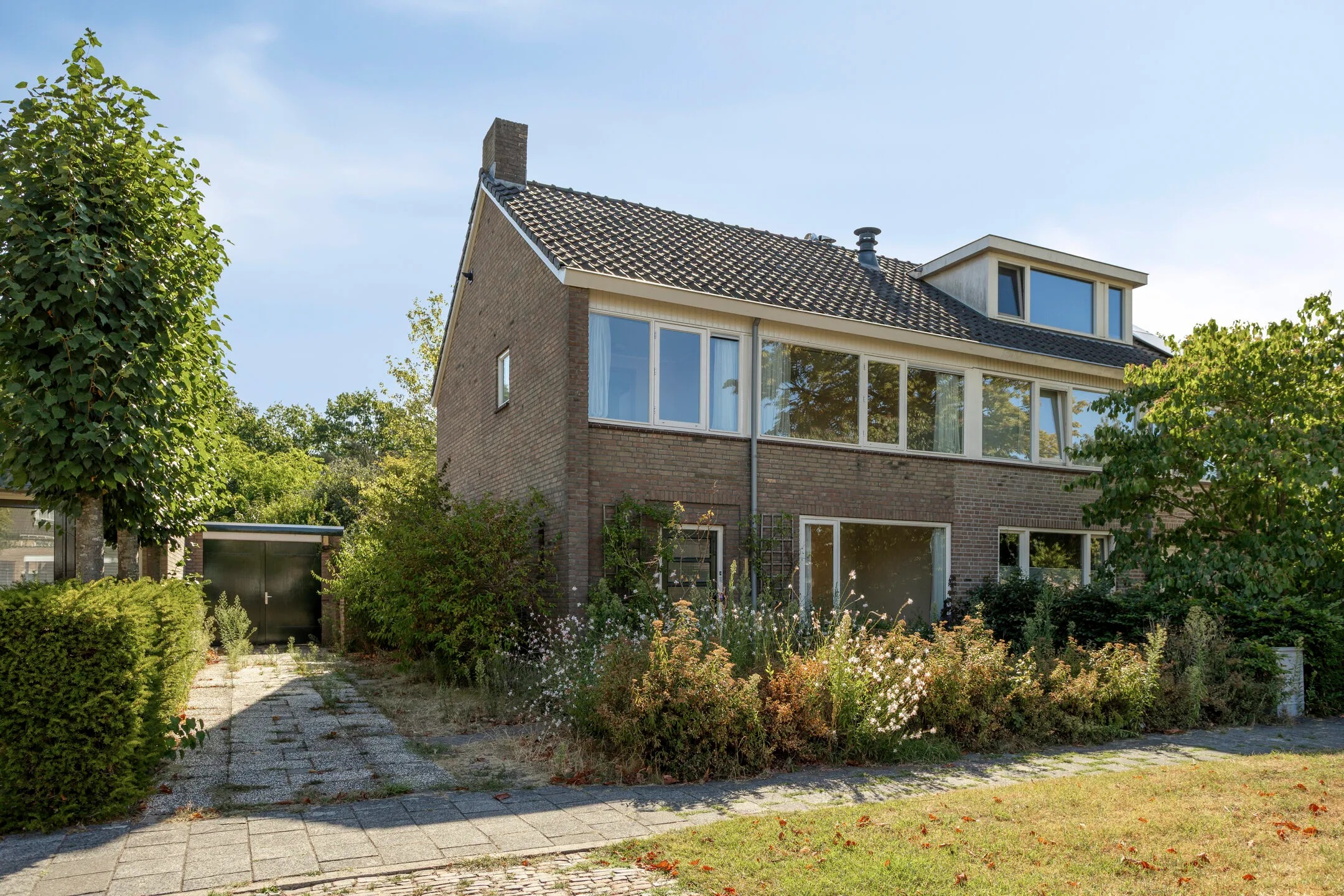 2-onder-1-kapwoning Debussylaan 18 in Rosmalen