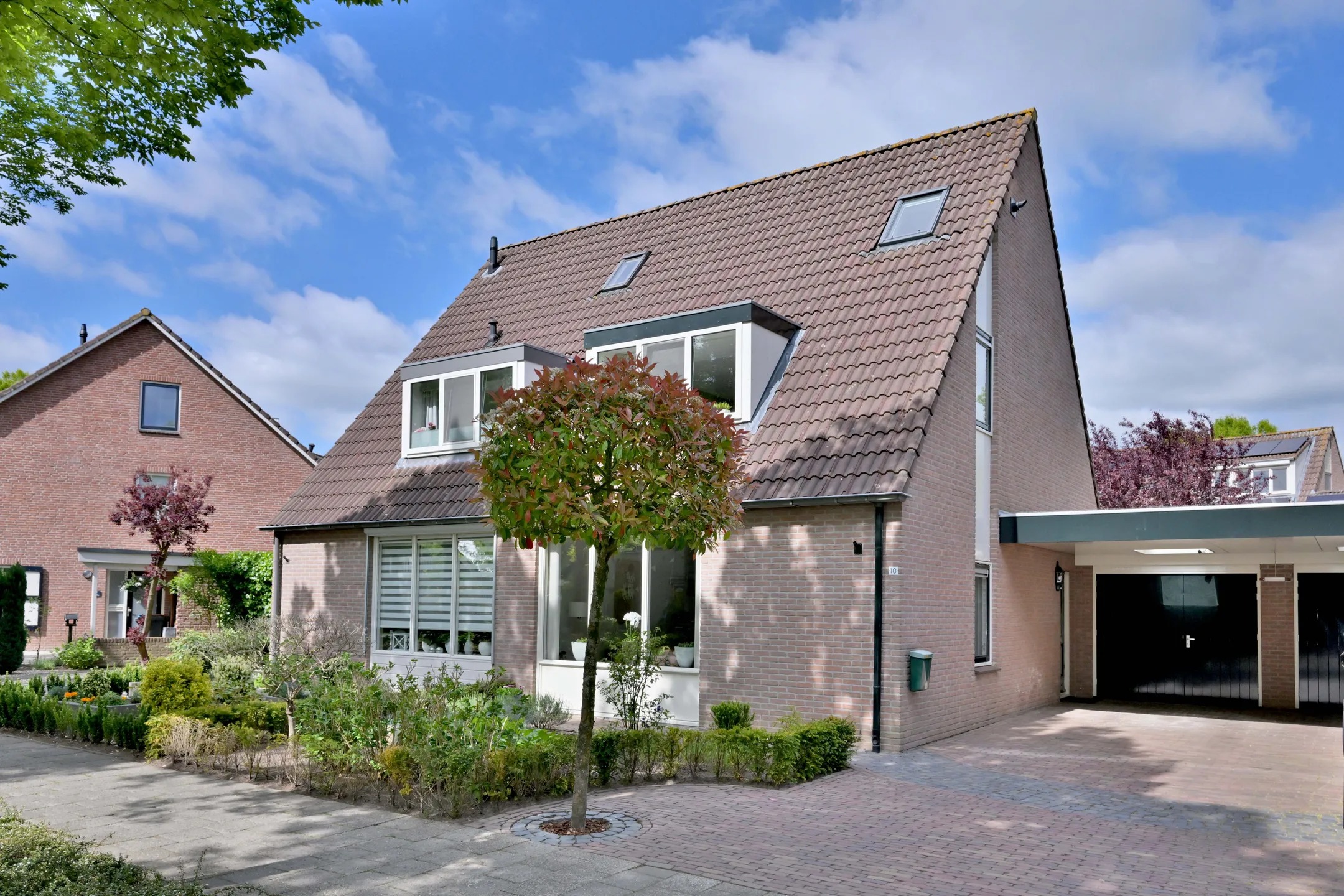 Geschakelde 2-onder-1-kapwoning De Haarmansenk 10 in Schalkhaar