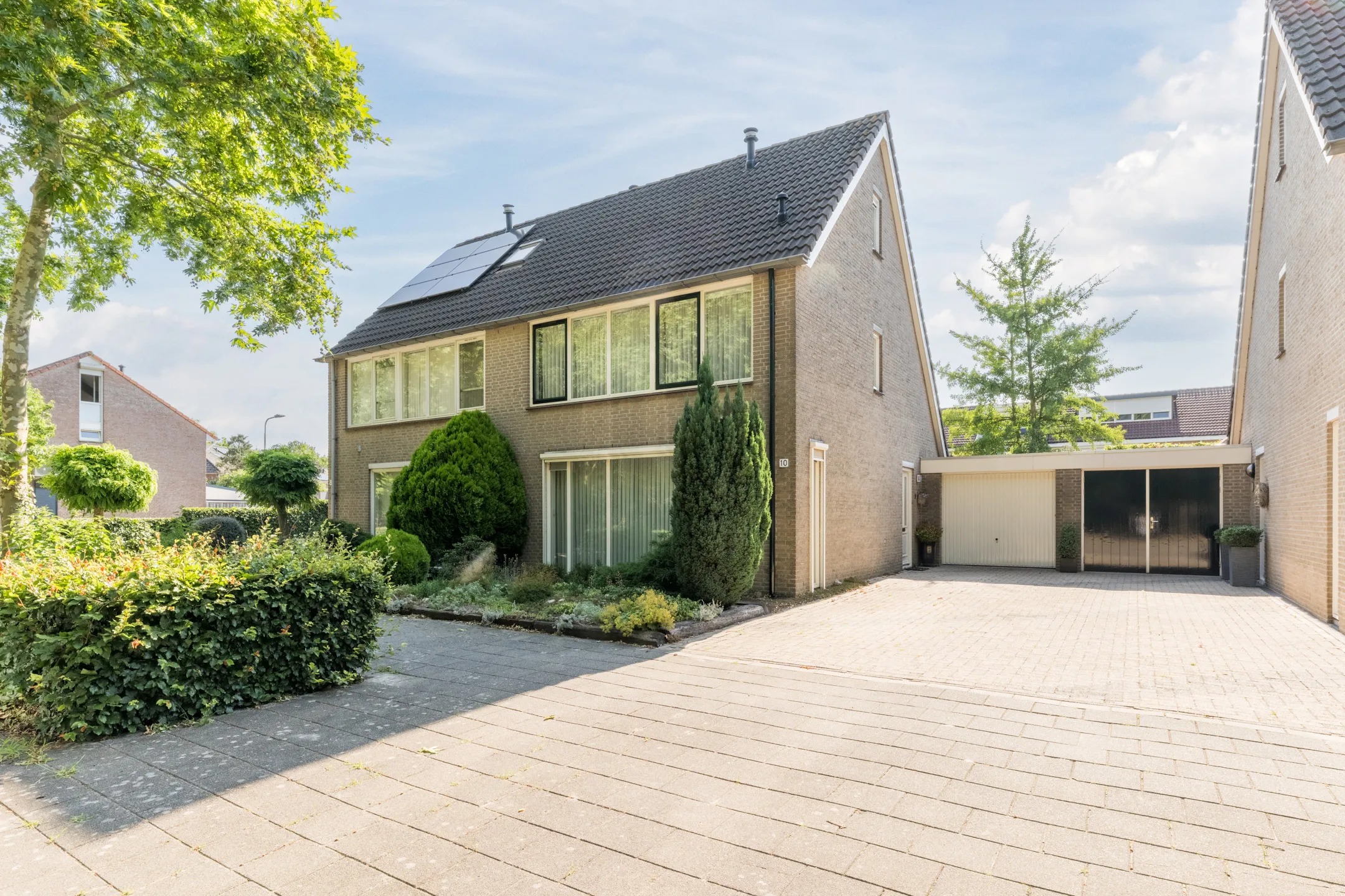 Geschakelde 2-onder-1-kapwoning Dinxperlolaan 10 in Tilburg