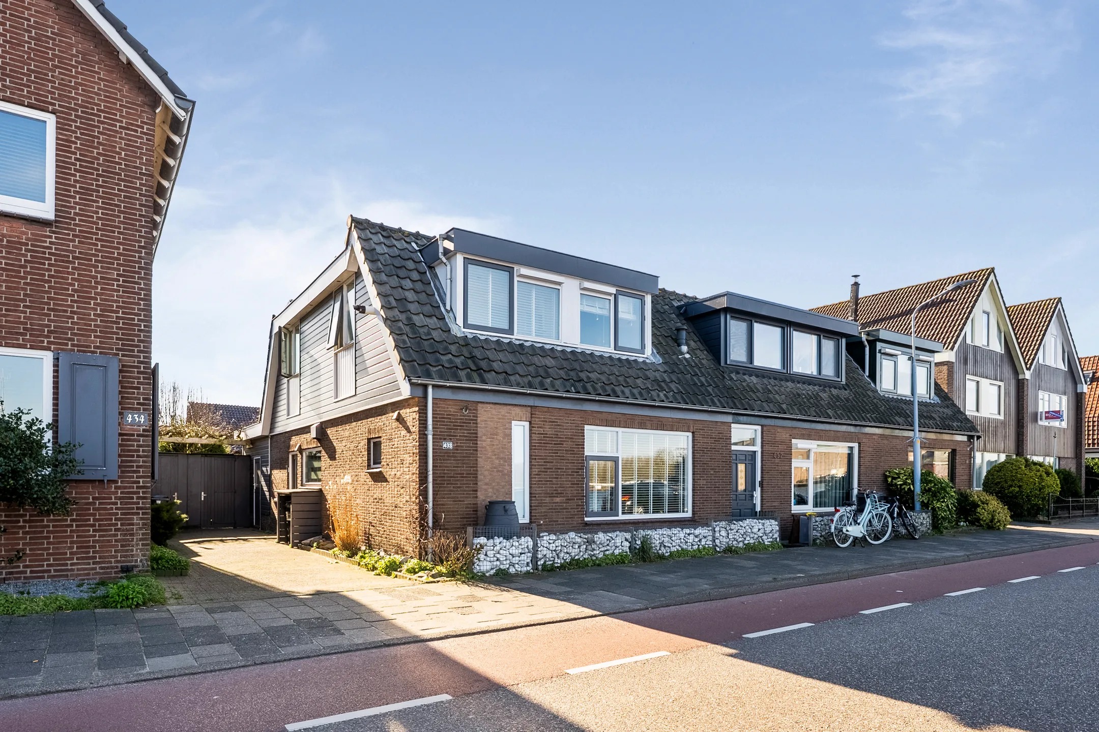 Hoekwoning (dijkwoning) Zwanenburgerdijk 433 in Zwanenburg