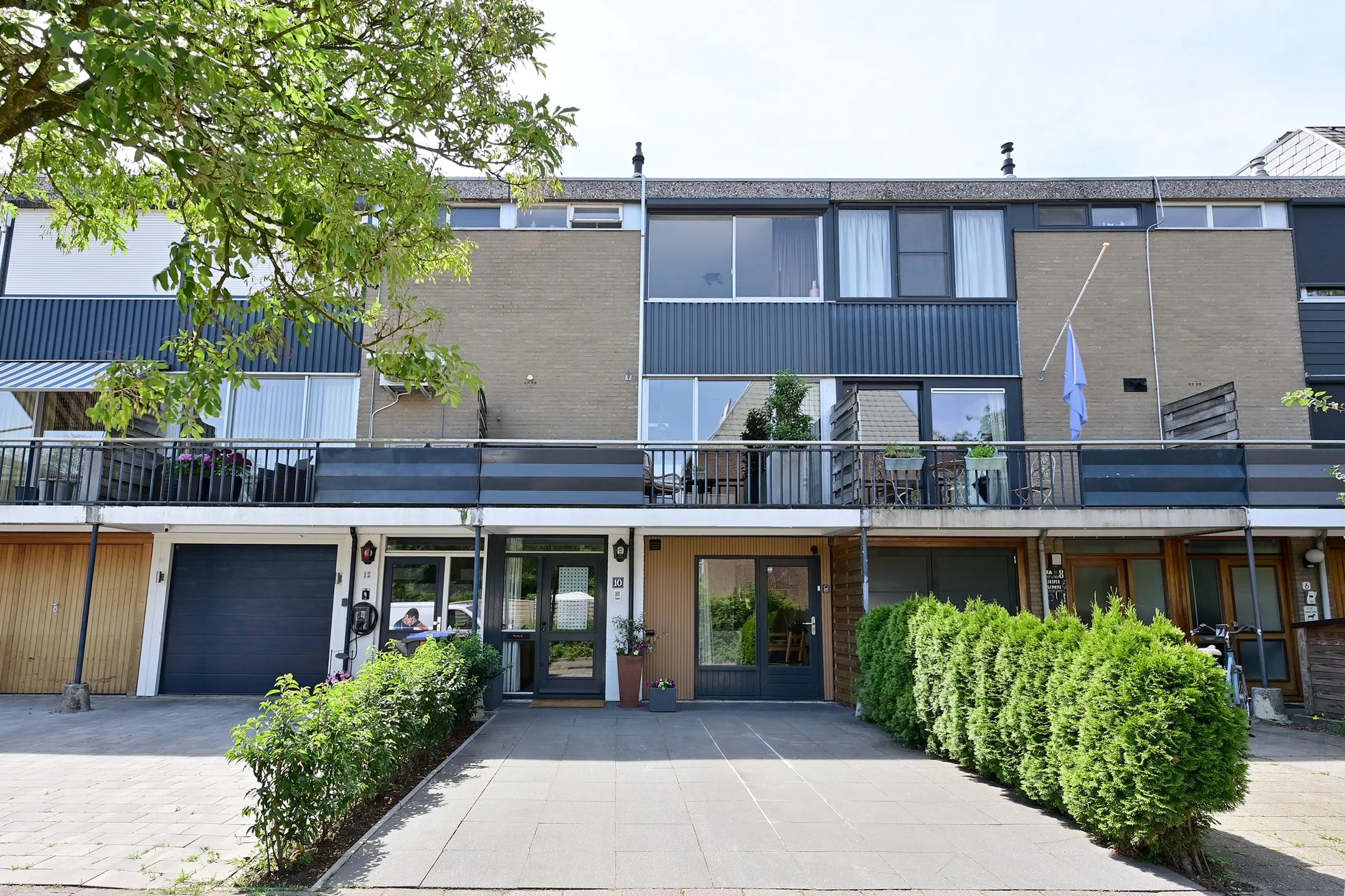 Tussenwoning (drive-in woning) Ra 10 in Huizen