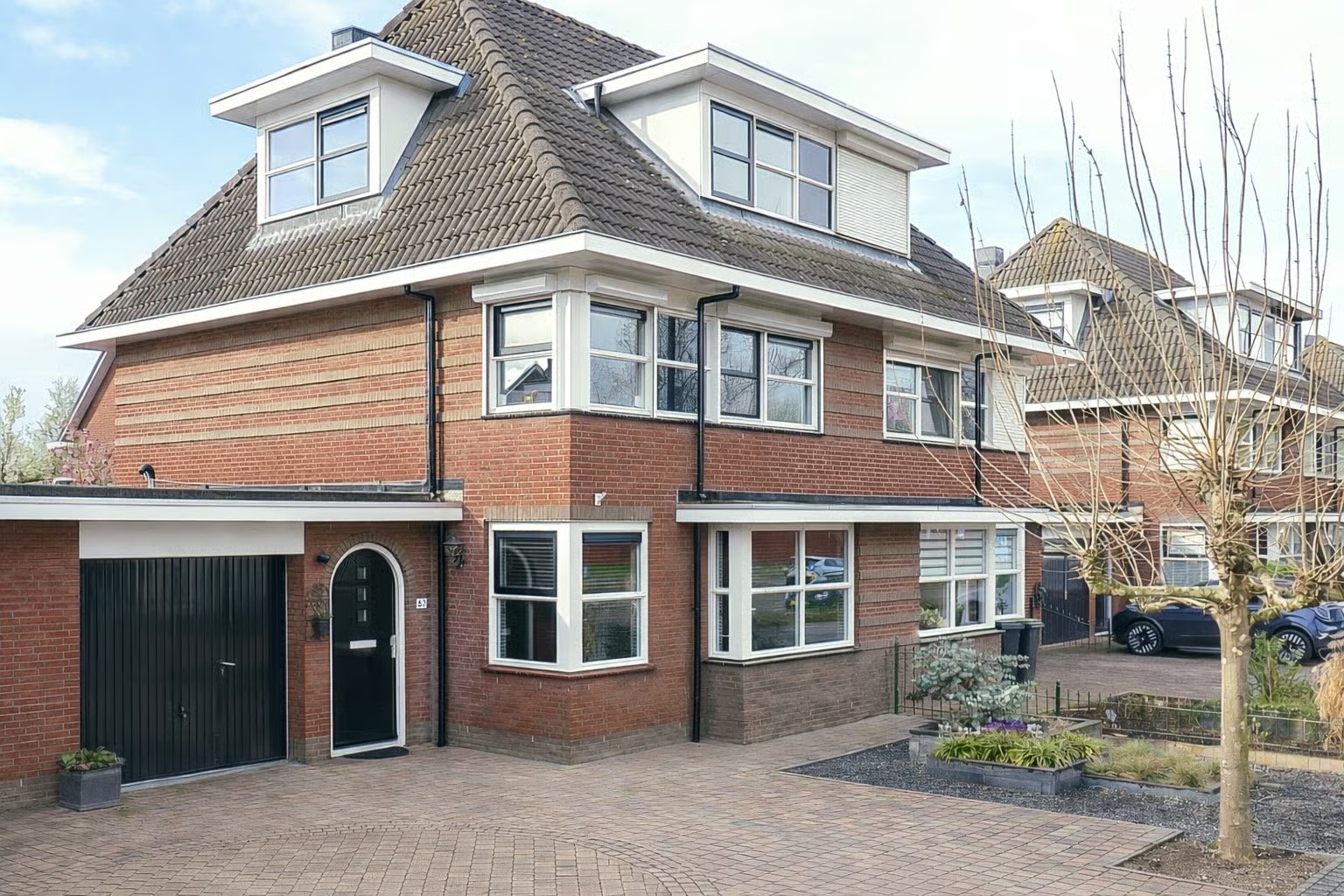 Geschakelde 2-onder-1-kapwoning Coendersberglaan 67 in Helmond