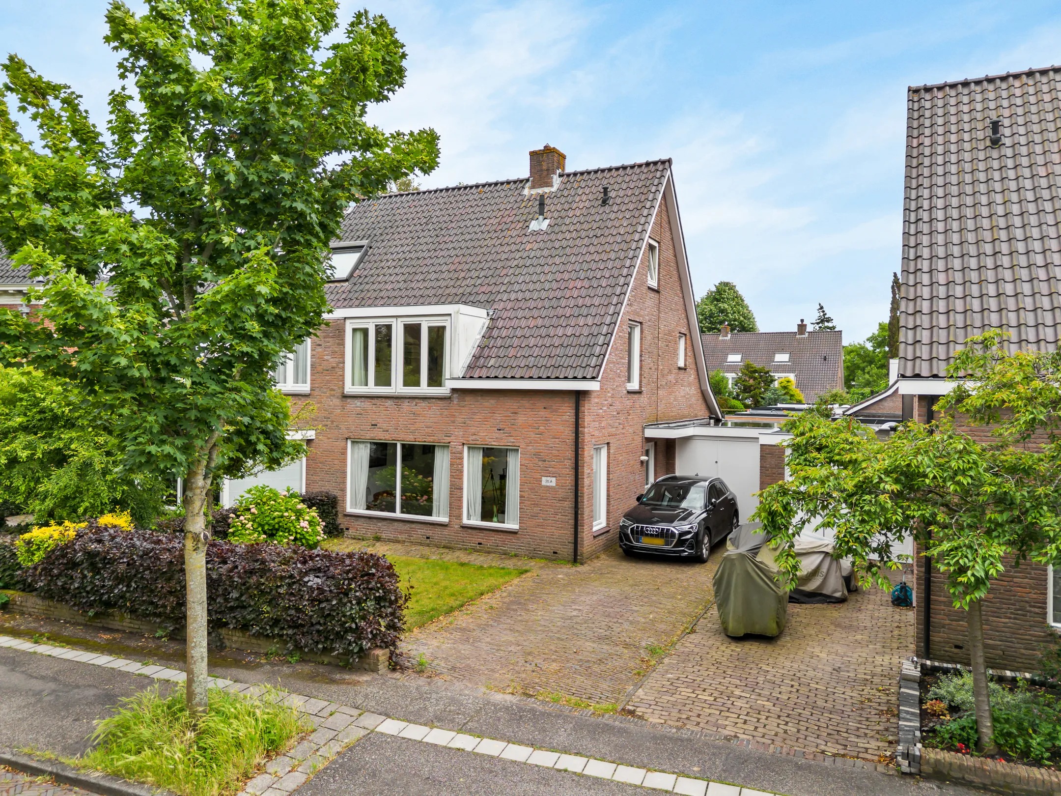 Geschakelde 2-onder-1-kapwoning Anna van Burenlaan 58 A in Haarlem