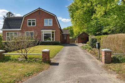 Eengezinswoning, 2-onder-1-kapwoning Hoge Hereweg 23 in Glimmen