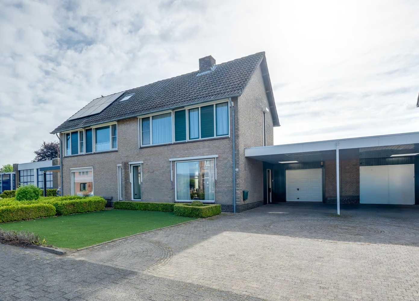 Geschakelde 2-onder-1-kapwoning Dongenseweg 14 A in Rijen