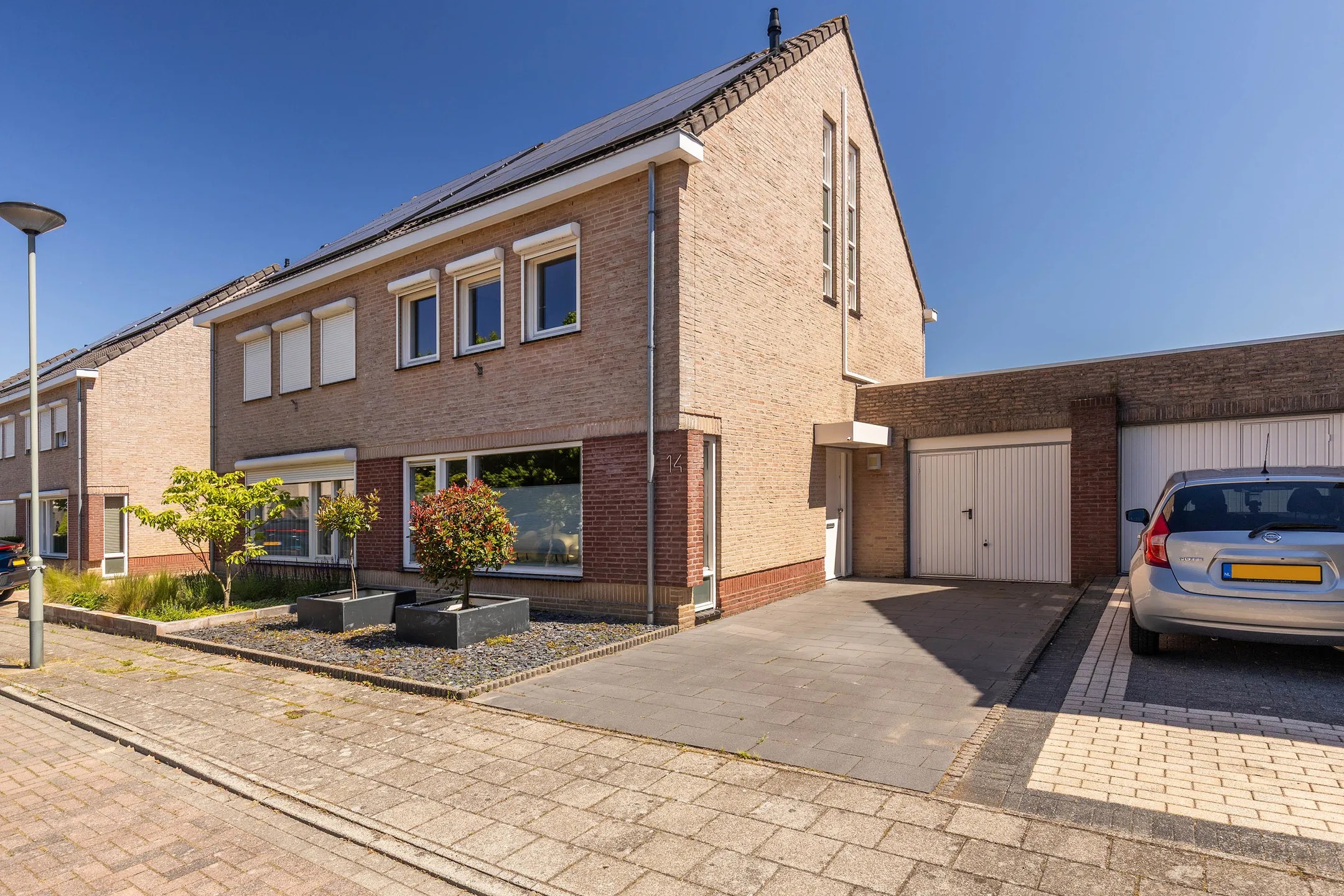 Geschakelde 2-onder-1-kapwoning Meidoorn 14 in Elsloo