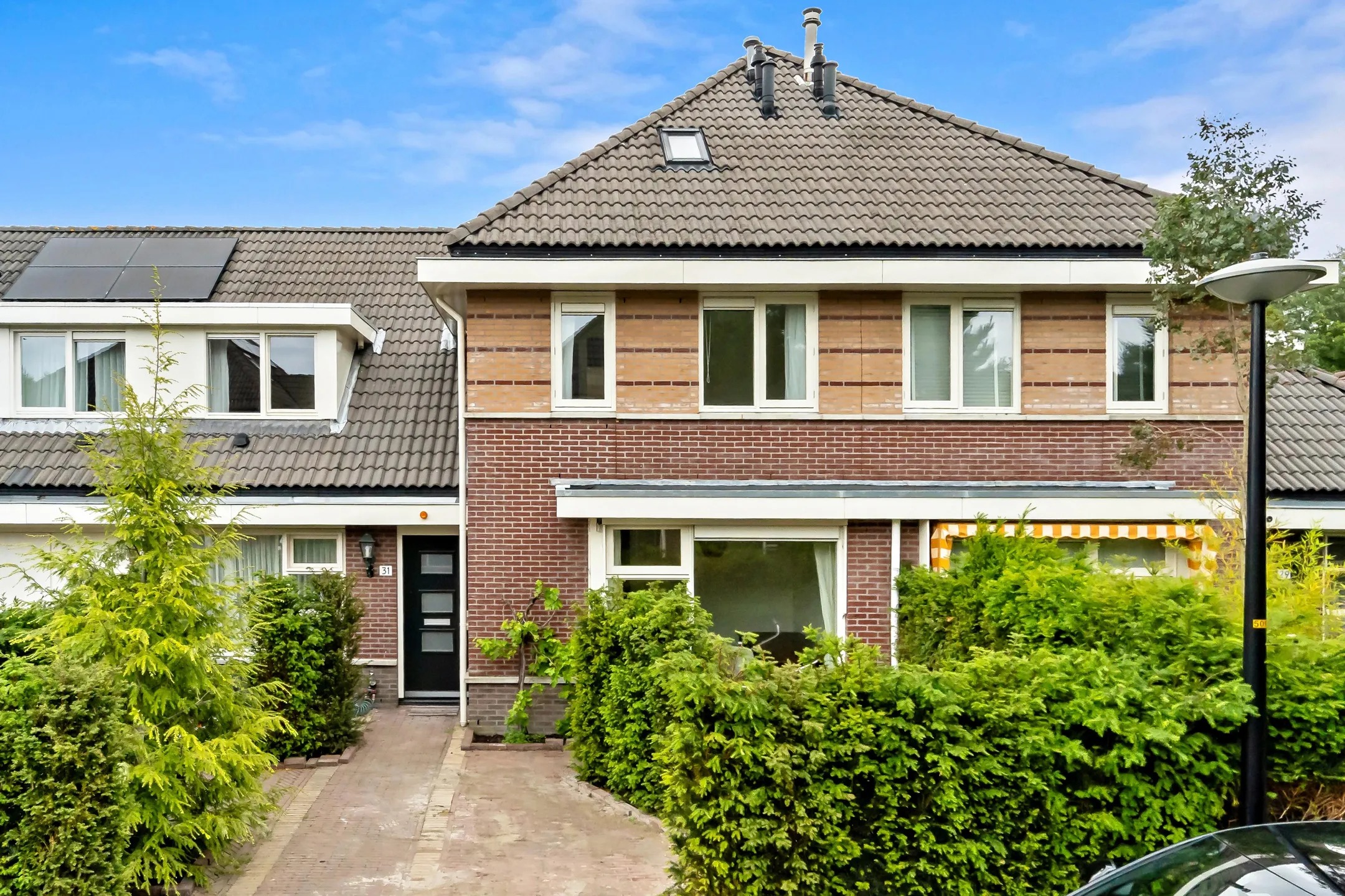 Geschakelde 2-onder-1-kapwoning Johan Watelerpad 31 in Den Haag
