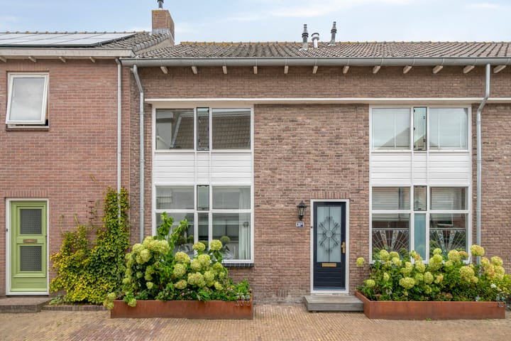 Eengezinswoning, tussenwoning Hoofdstraat 36 B in Wolphaartsdijk