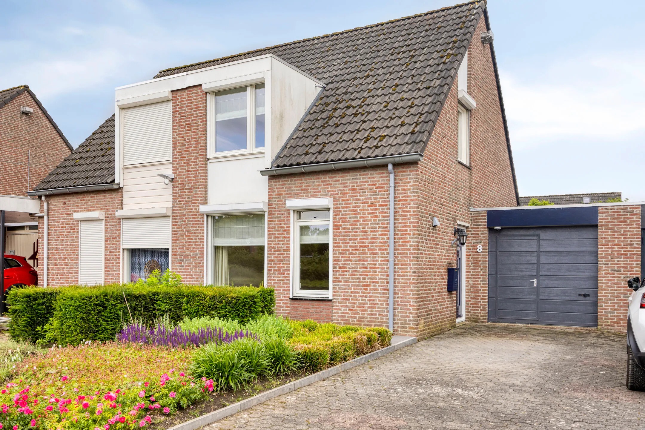 Geschakelde 2-onder-1-kapwoning Molenweg 8 in Swalmen