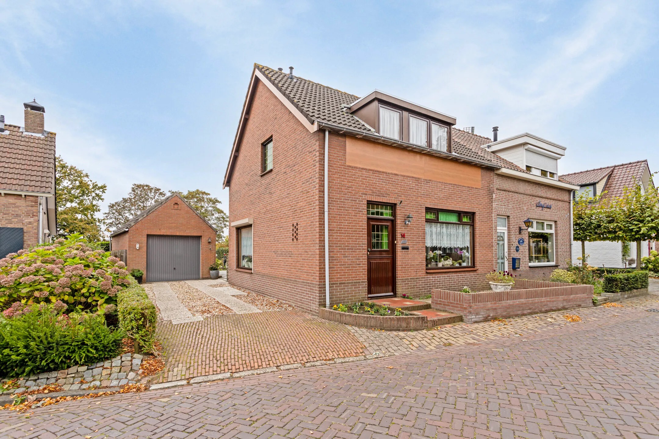 2-onder-1-kapwoning Nieuwe Molenweg 14 in Halsteren