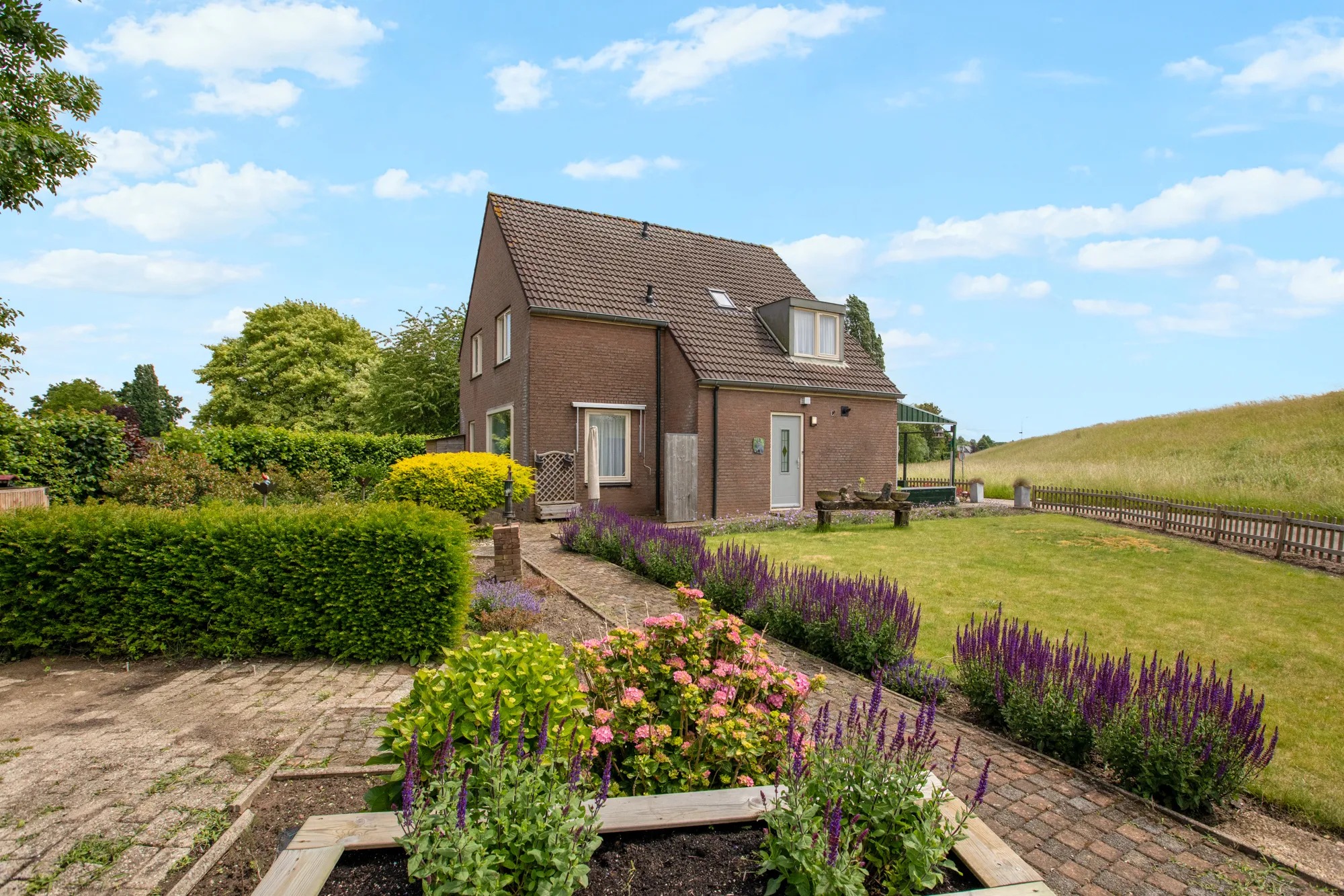 Vrijstaande woning (dijkwoning) Husselarijstraat 58 in Loo Gld