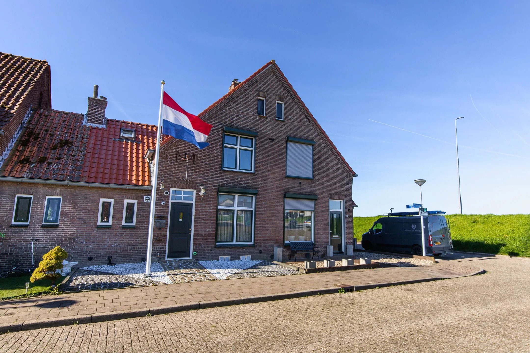 Geschakelde 2-onder-1-kapwoning Rheastraat 11 Tolkamer
