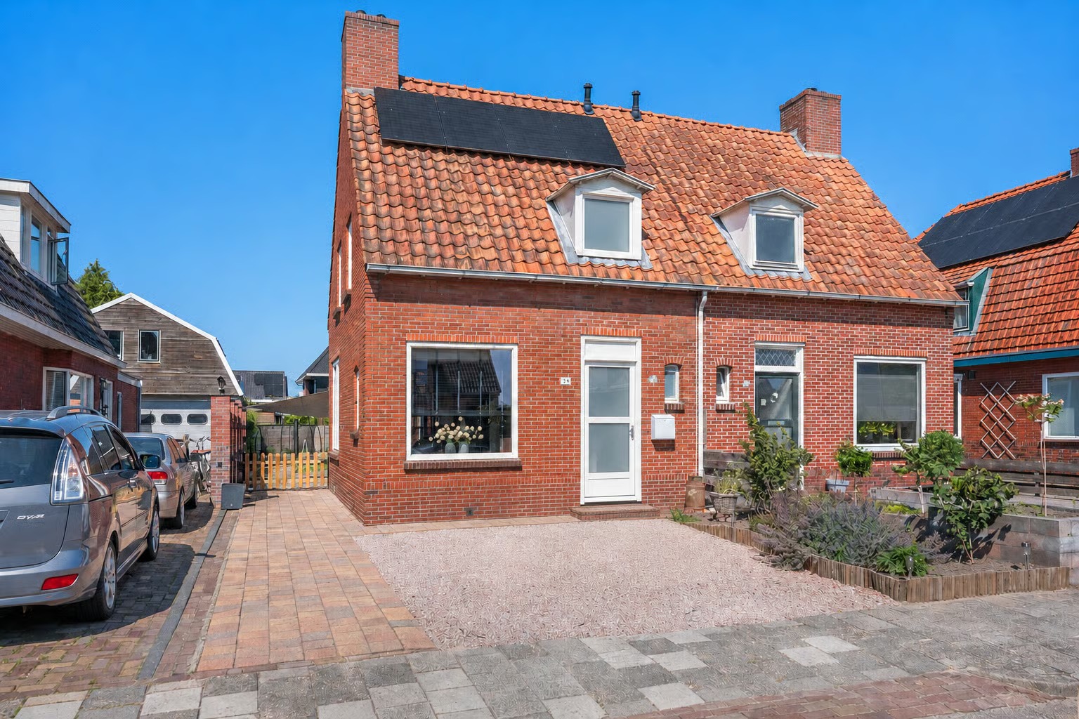 2-onder-1-kapwoning Herenstraat 28 in Sappemeer