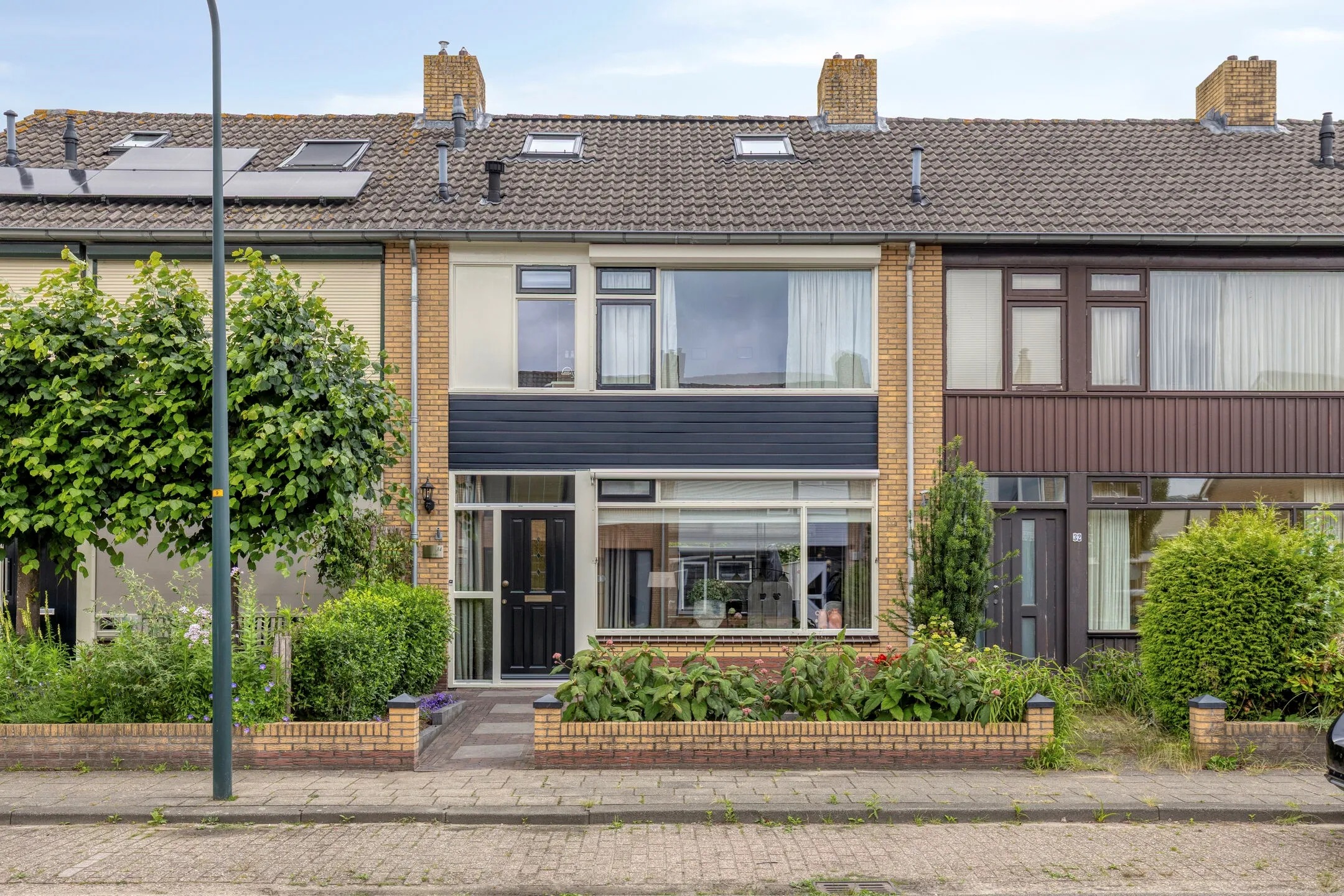 Tussenwoning Burgemeester Hoytema van Konijnenburglaan 34 in Scherpenzeel
