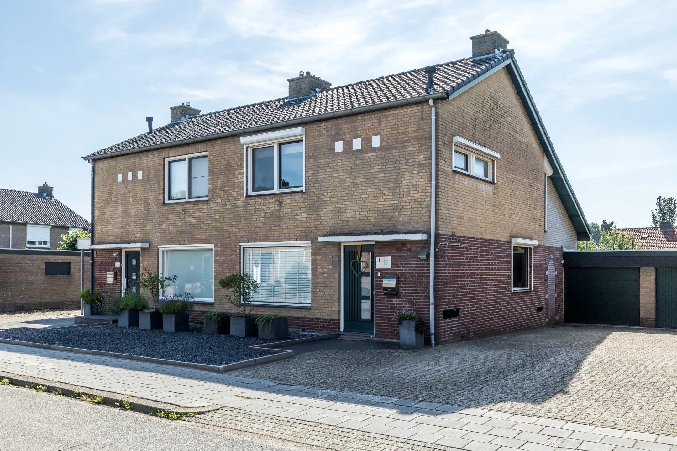 Geschakelde 2-onder-1-kapwoning Irenestraat 3 in Hulsberg