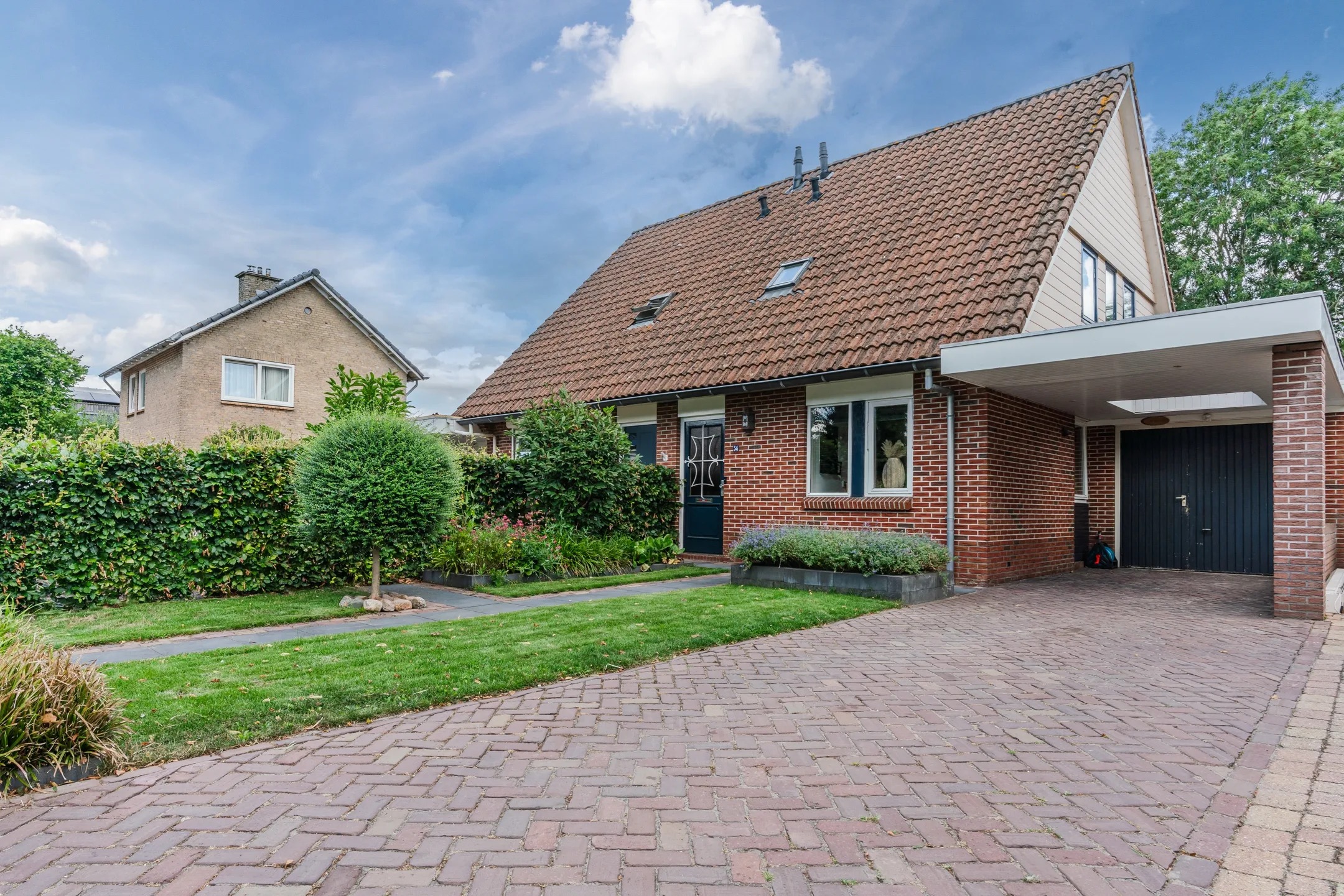 Geschakelde 2-onder-1-kapwoning Nieuwstraat 54 in Vroomshoop