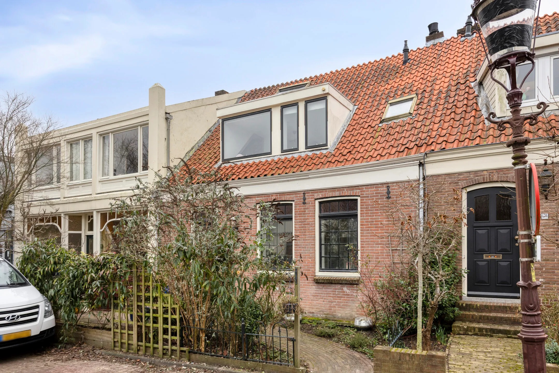 Tussenwoning (dijkwoning) Nieuwendammerdijk 172 in Amsterdam