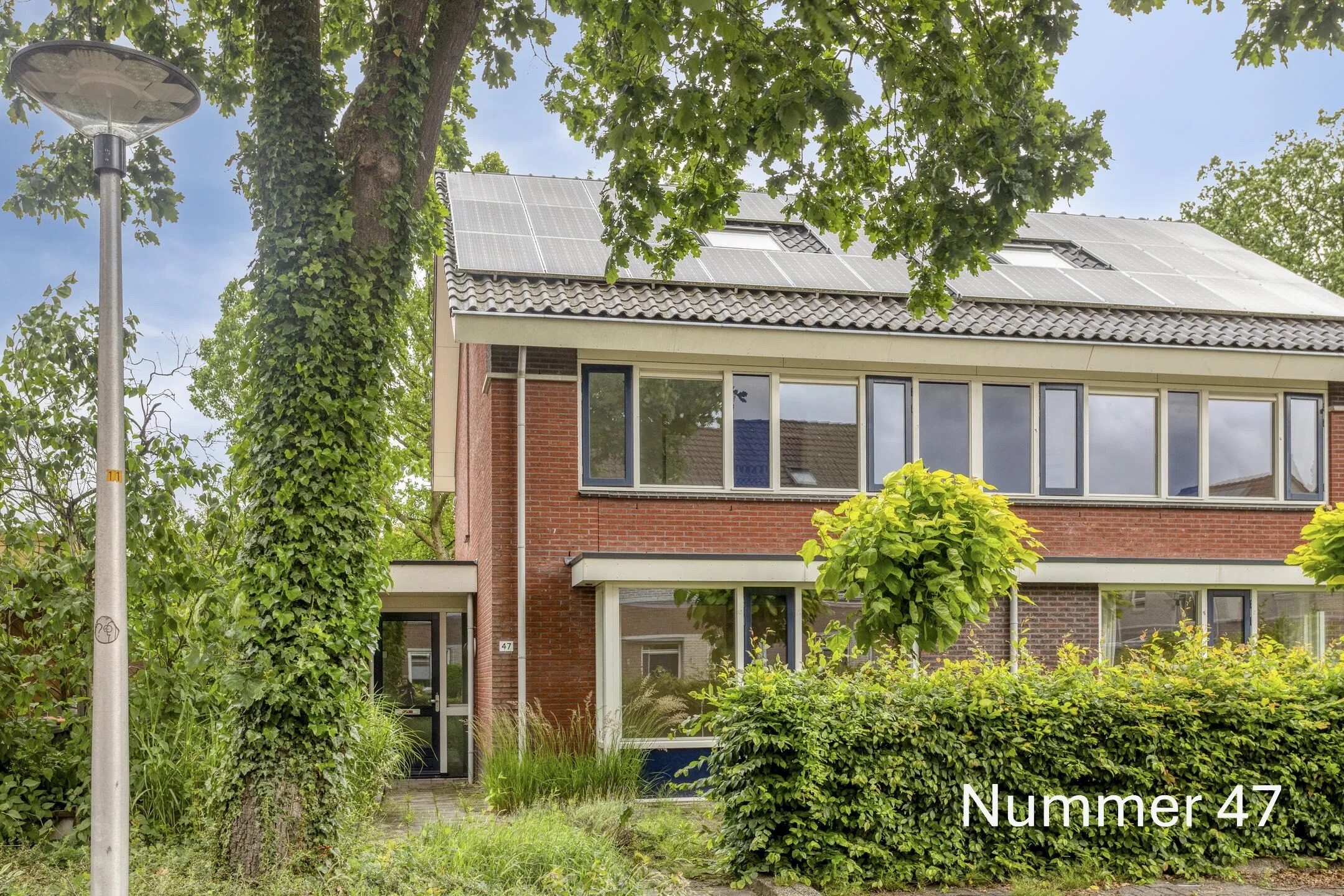 2-onder-1-kapwoning Toccatastraat 49 in Enschede