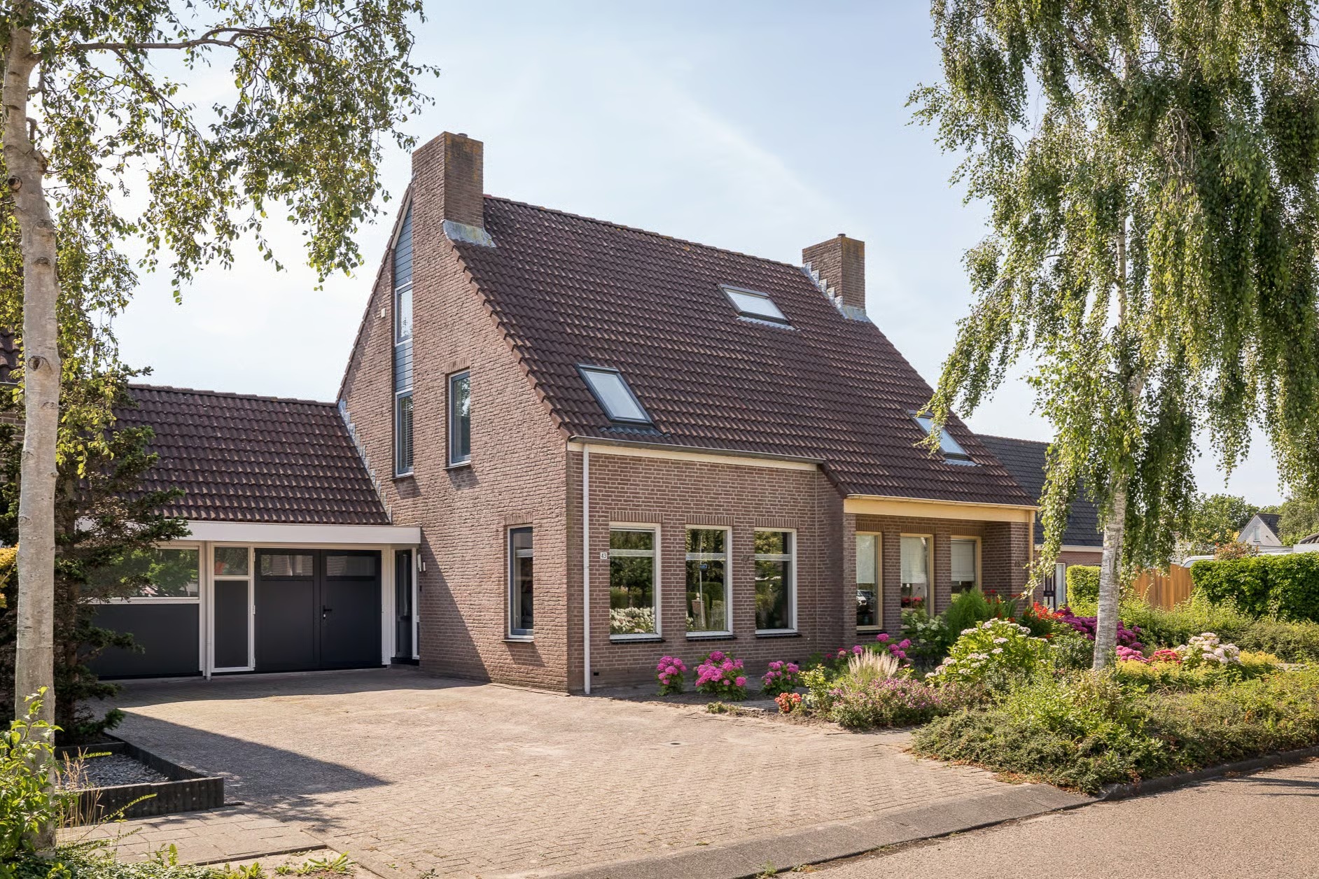 Geschakelde 2-onder-1-kapwoning Molenwei 43 in Hoogkarspel