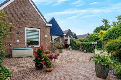 Eengezinswoning, geschakelde woning Damlust 8 in Leersum