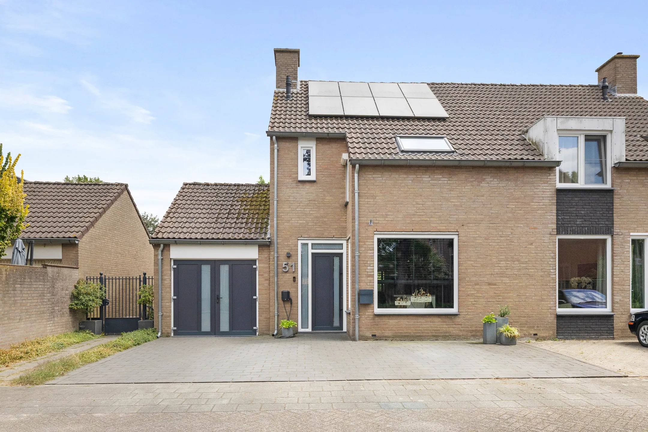 2-onder-1-kapwoning Burg. Cremershof 51 in Panningen