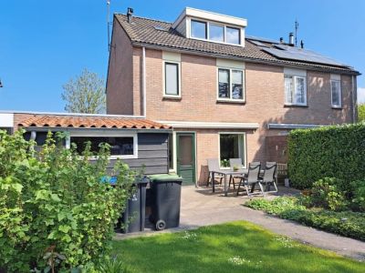 Eengezinswoning, geschakelde 2-onder-1-kapwoning Laan der Verenigde Naties 128 in Goes
