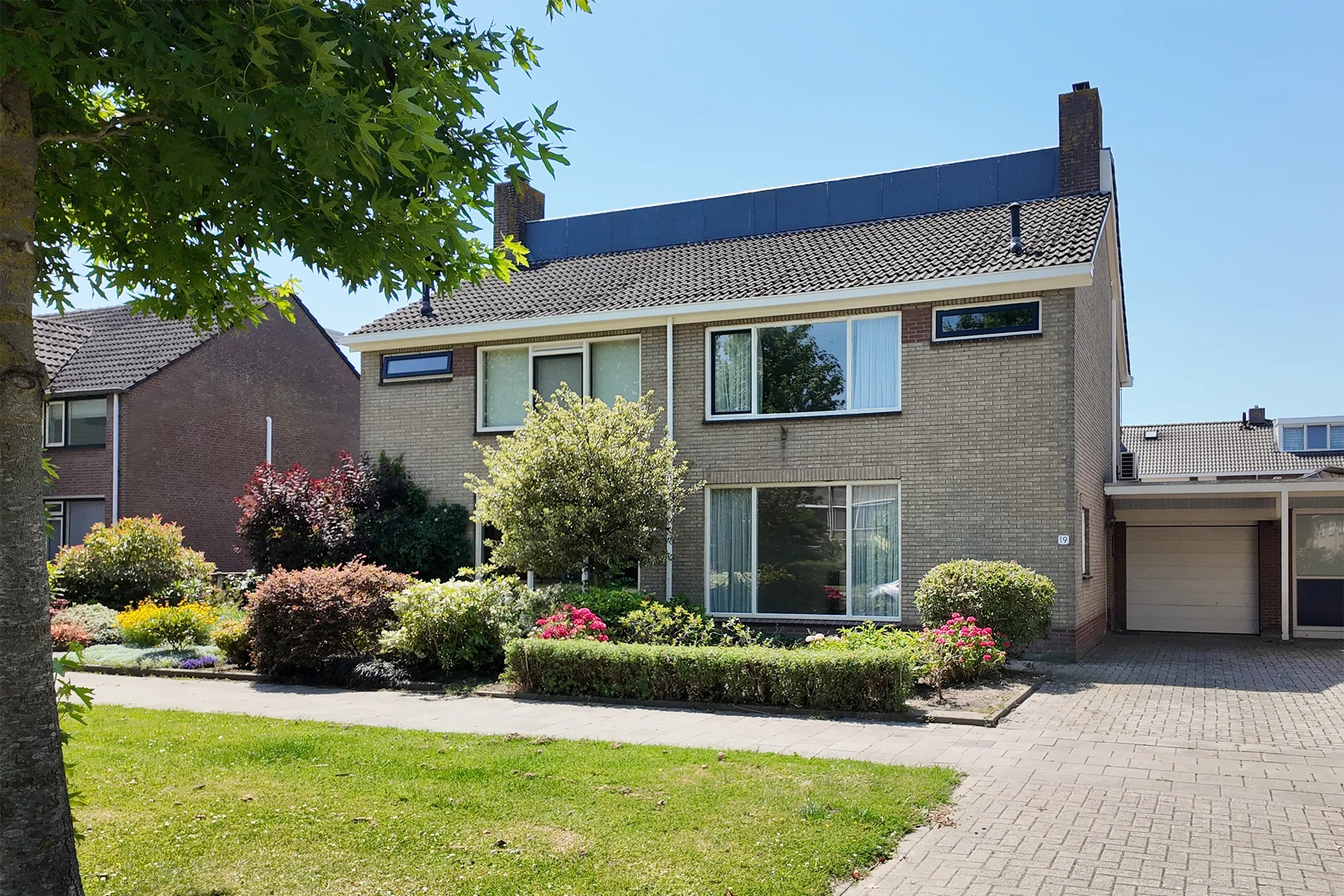 2-onder-1-kapwoning Nieuwe Dorpsweg 19 in Fijnaart