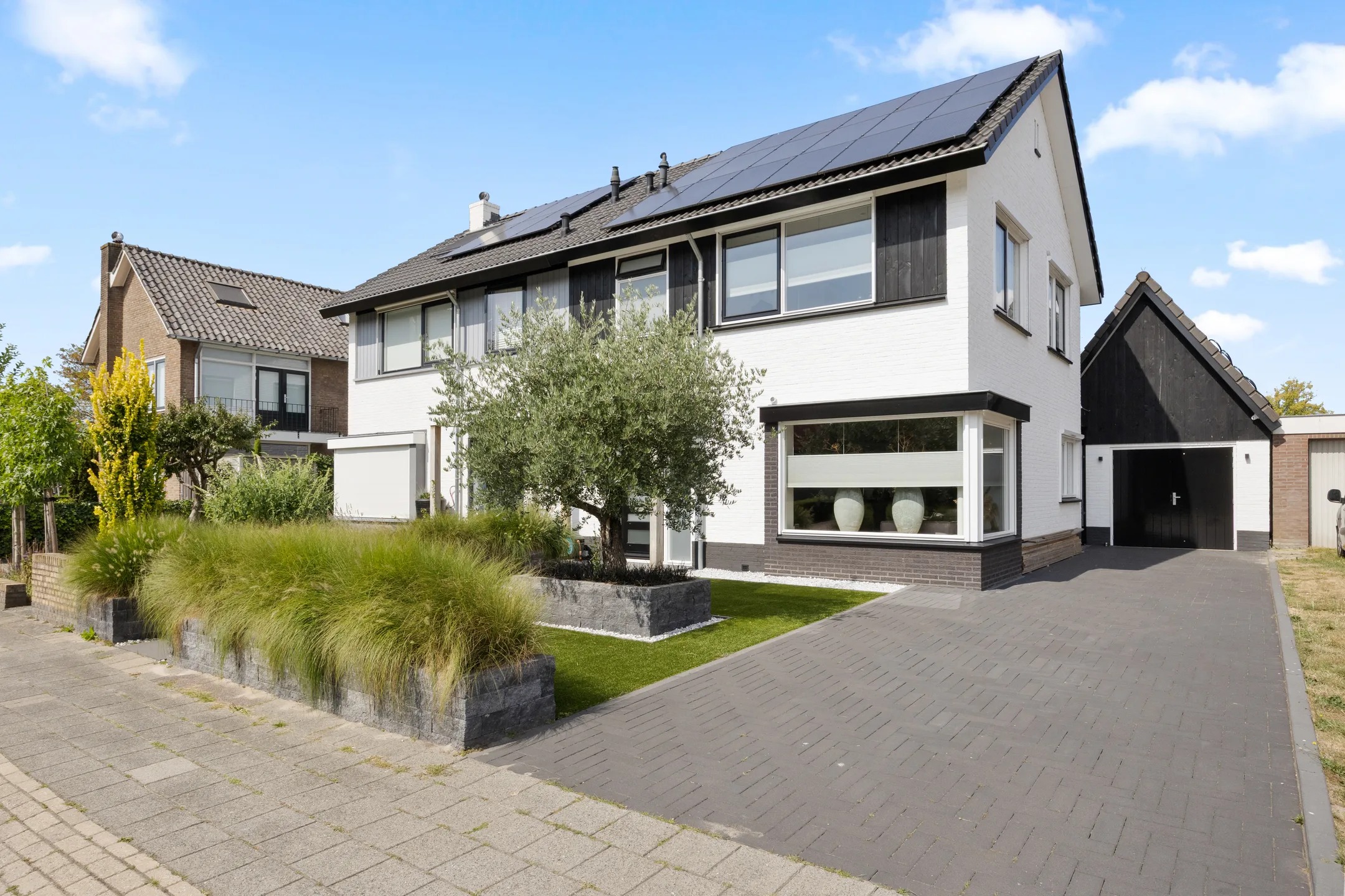 2-onder-1-kapwoning Koninginnelaan 7 in Voorthuizen