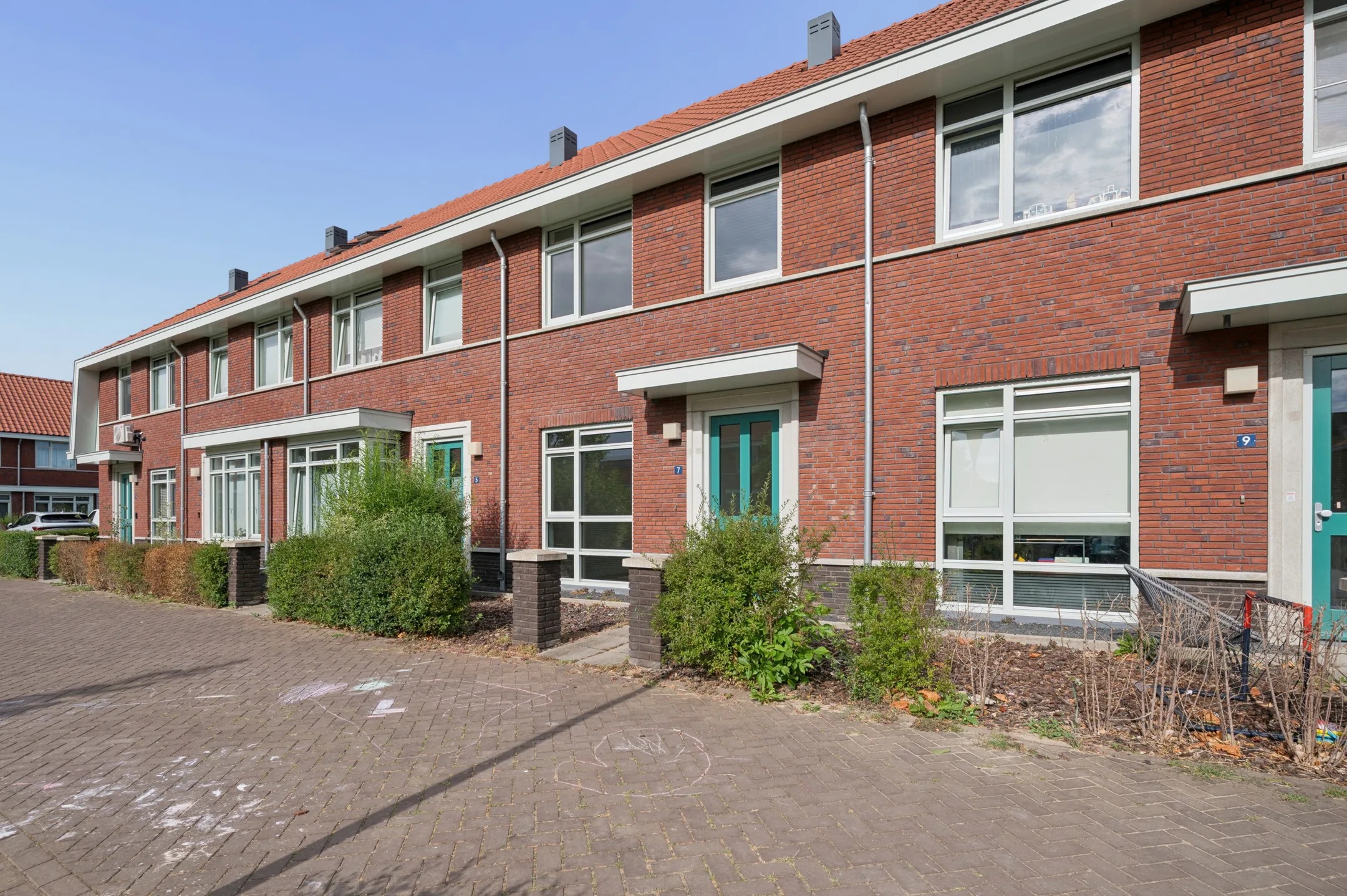 Tussenwoning (hofjeswoning) Leeuw 7 in Elst