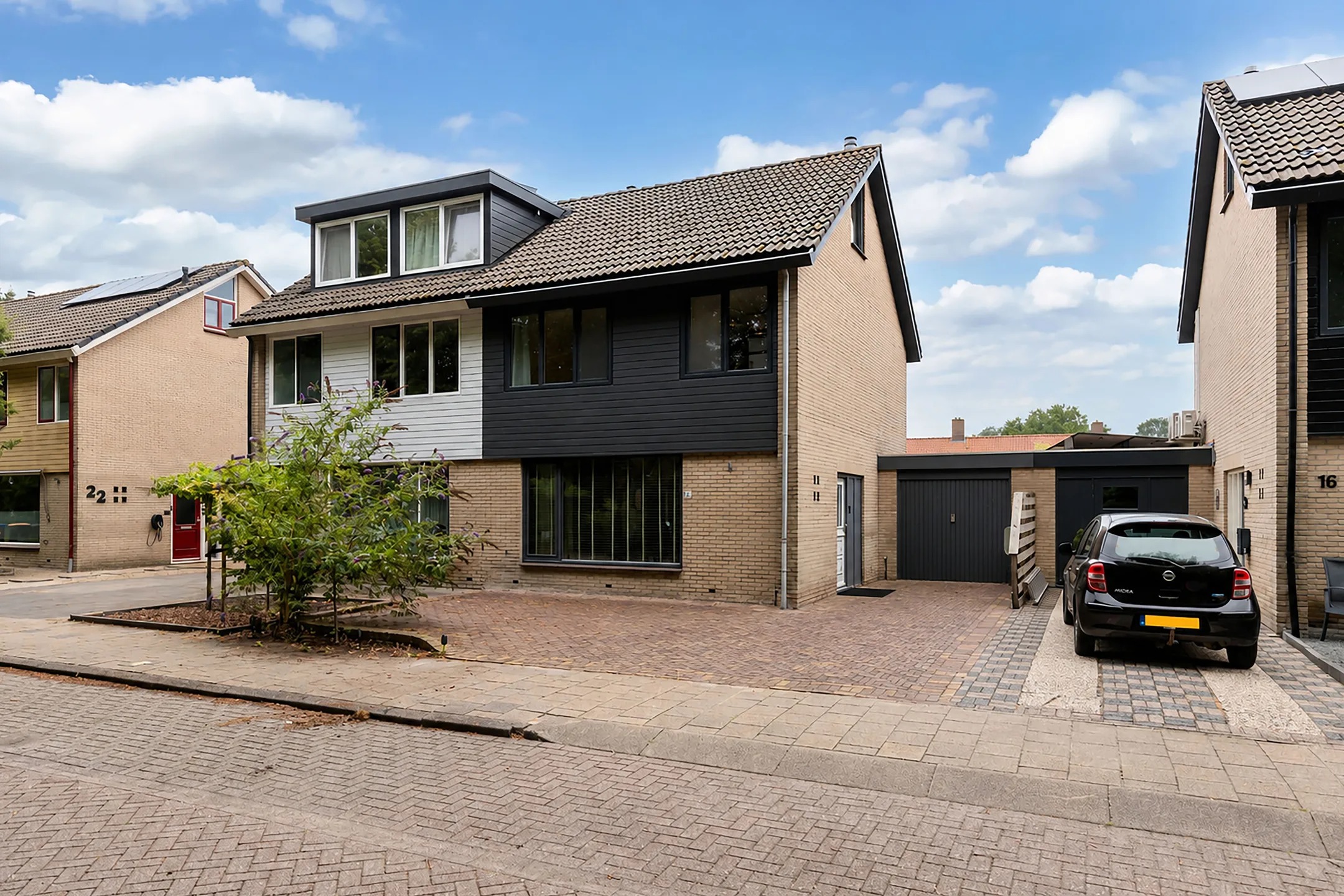 Geschakelde 2-onder-1-kapwoning Sportsingel 18 in Bant