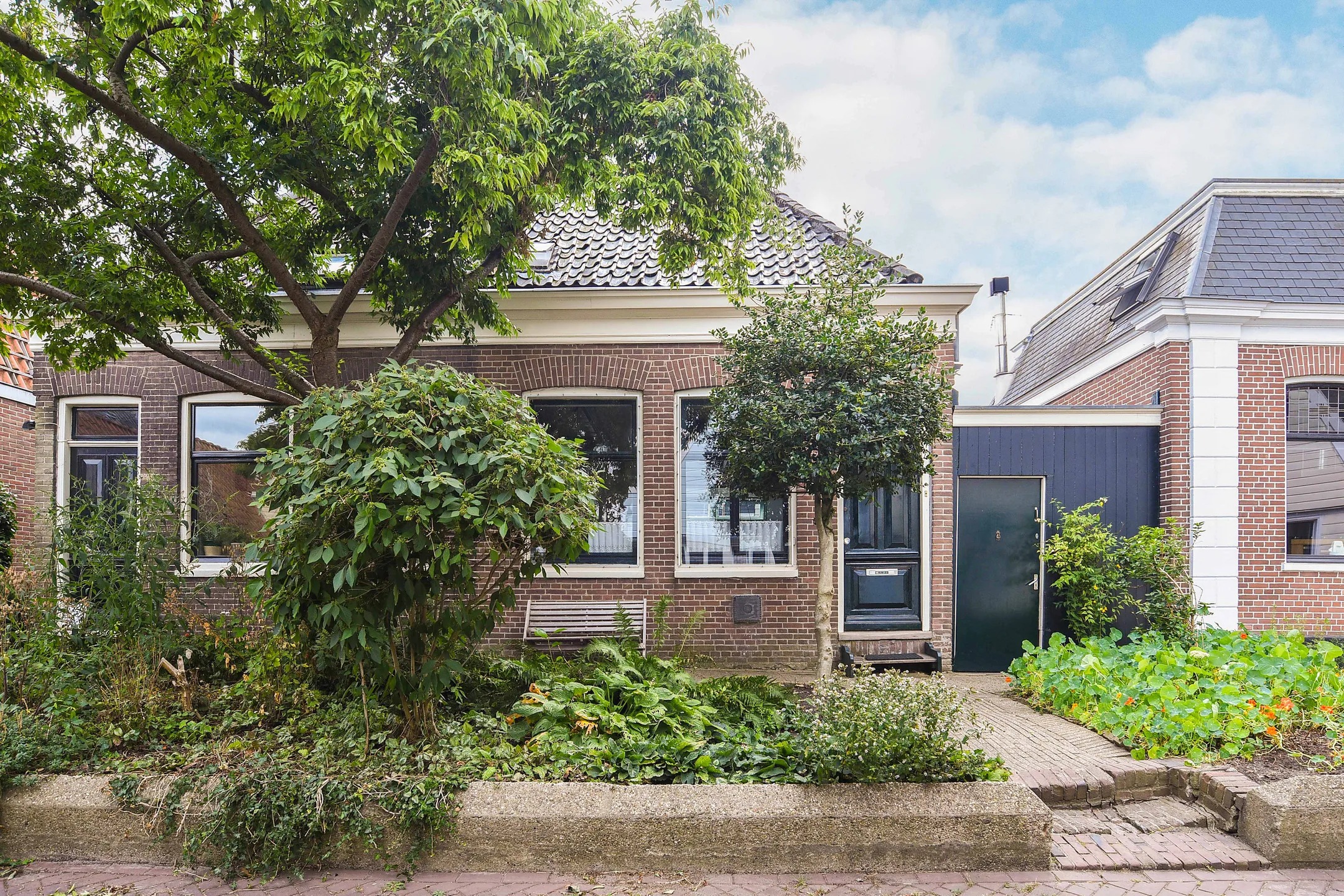 2-onder-1-kapwoning (dijkwoning) Nieuwendammerdijk 220 in Amsterdam