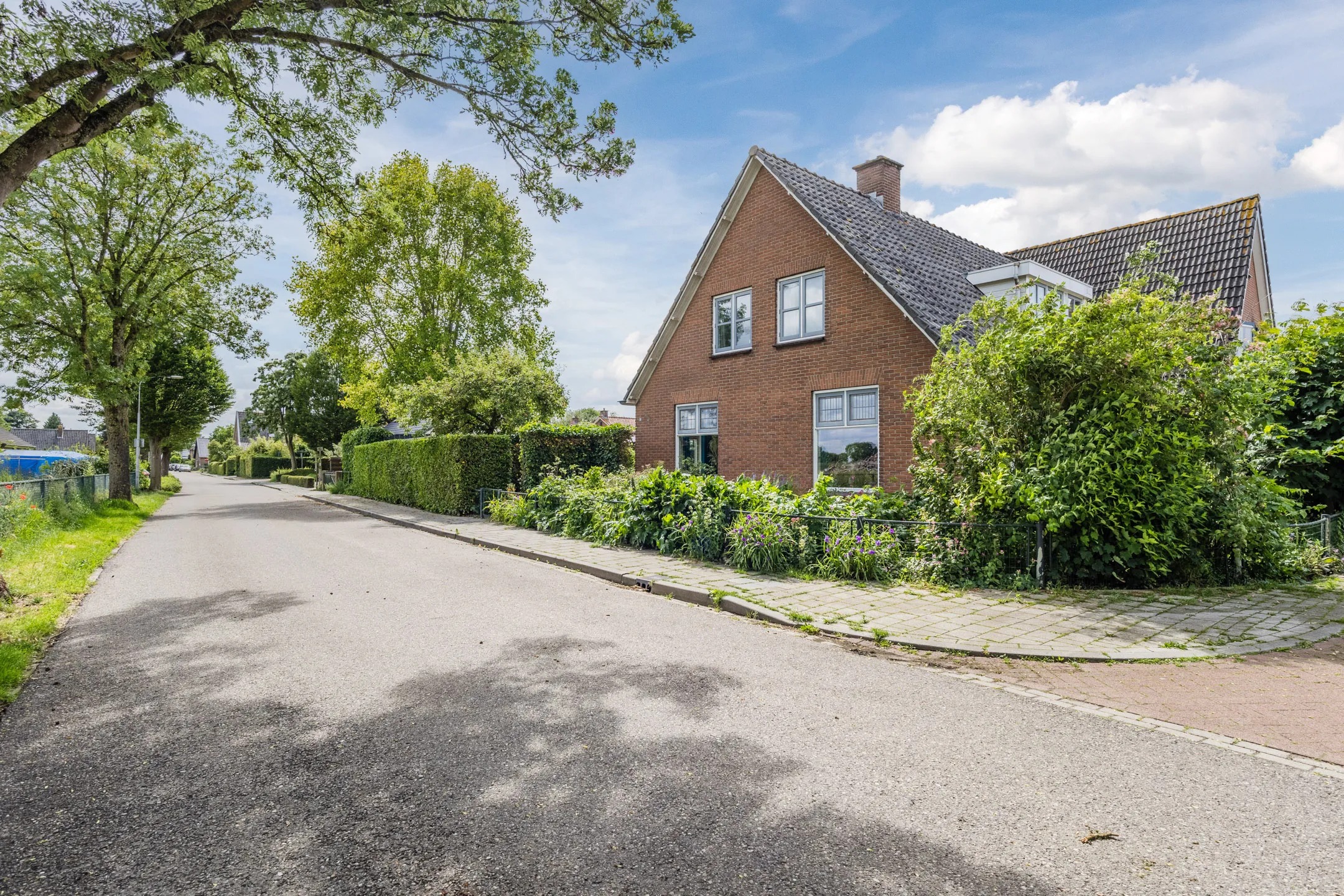 2-onder-1-kapwoning Kerkstraat 32 in Randwijk