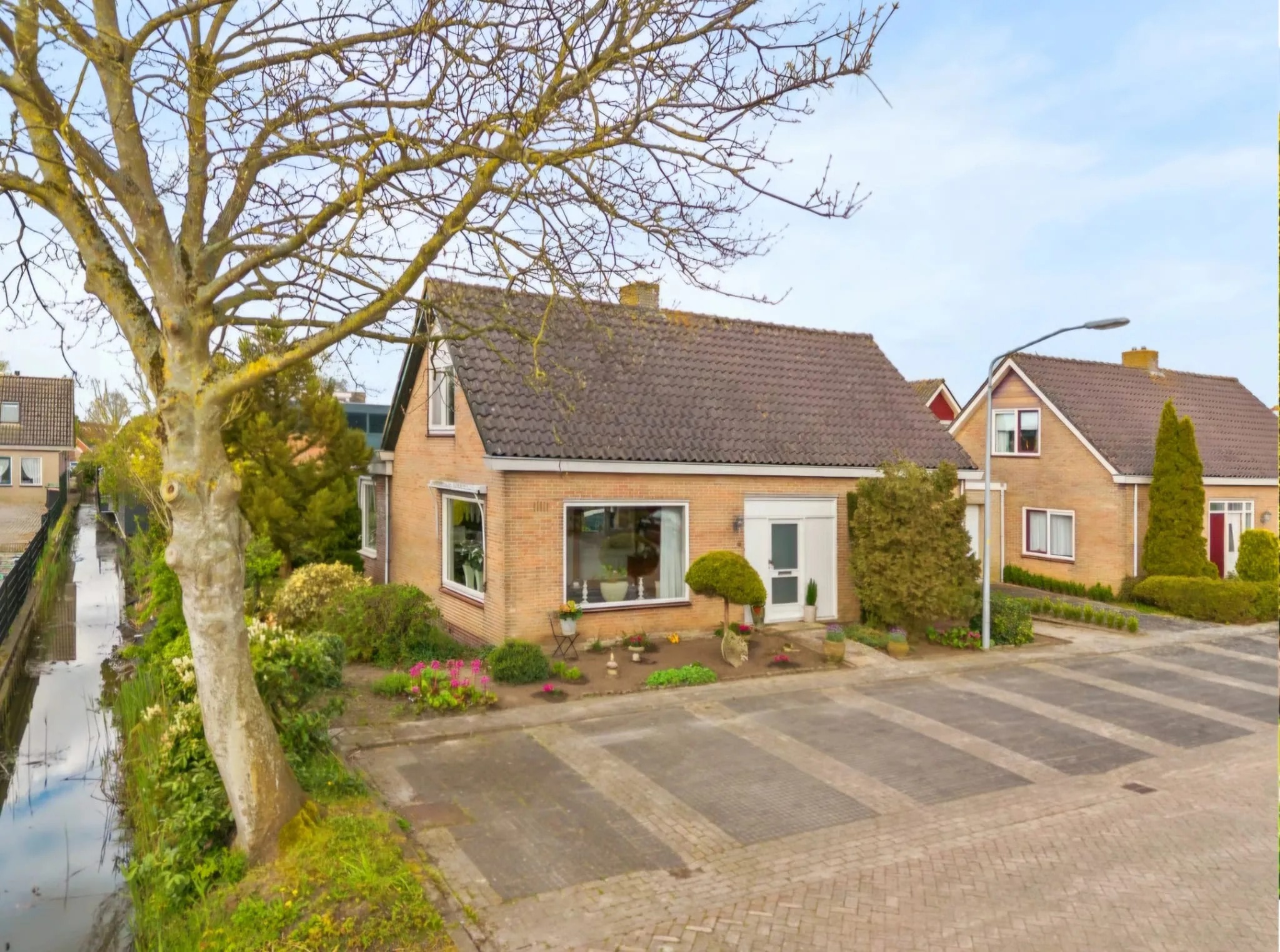 Vrijstaande woning (semi-bungalow) Sportlaan 8 in Wervershoof