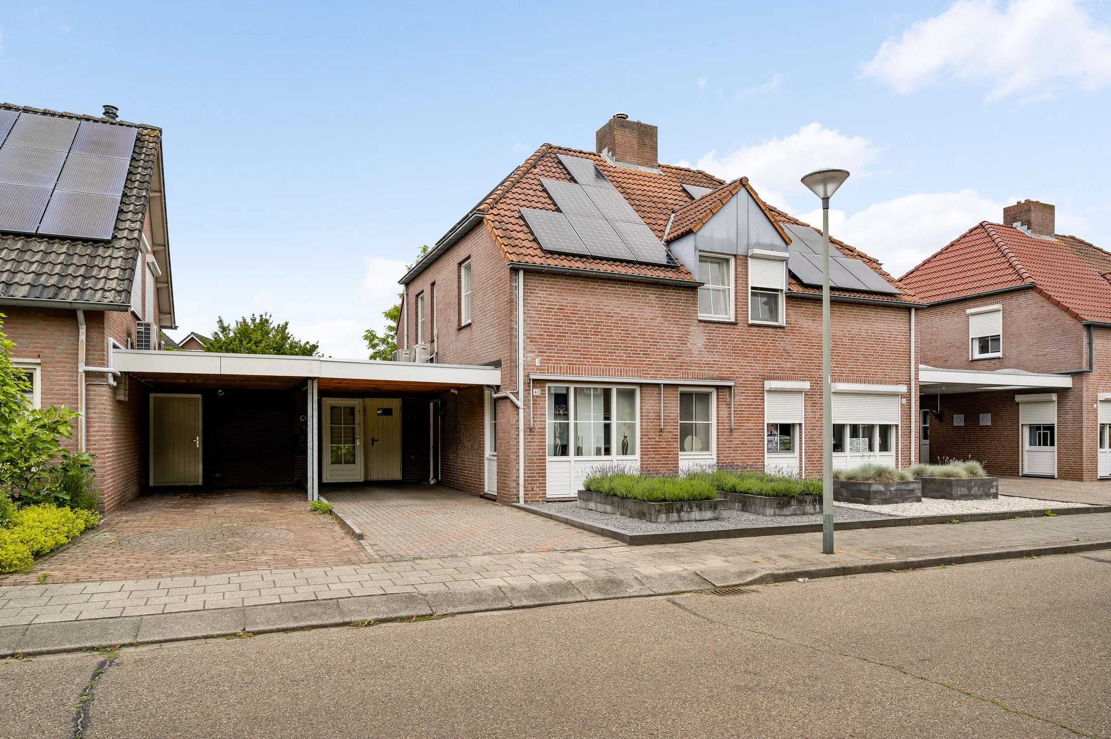 Geschakelde 2-onder-1-kapwoning Van Vlattenstraat 40 in Sevenum