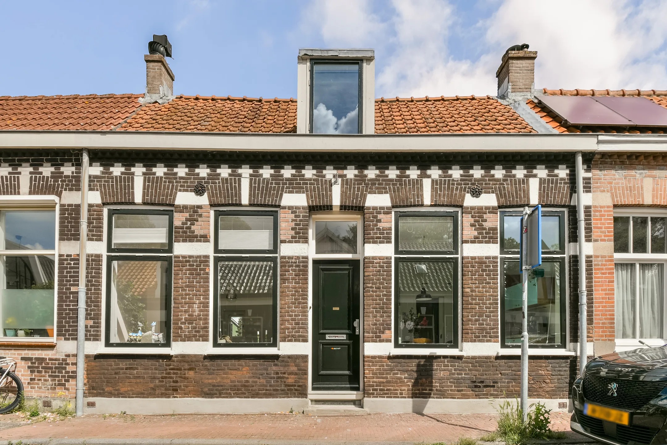 Tussenwoning (dijkwoning) Nieuwendammerdijk 51 in Amsterdam
