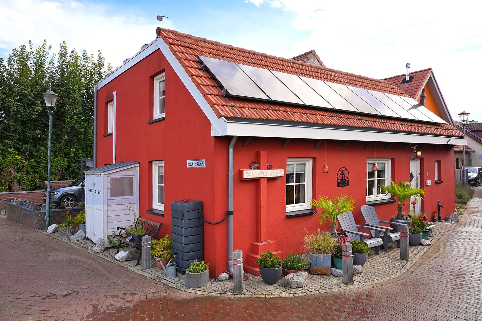 Geschakelde woning (dijkwoning) Visserweert 42 Roosteren