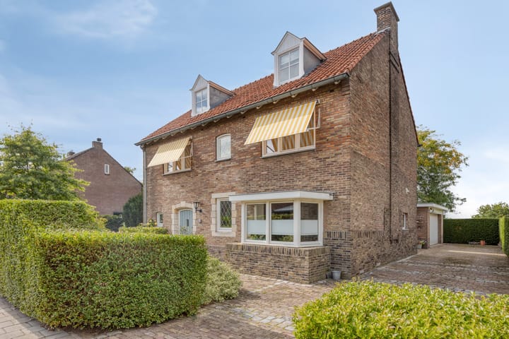 Eengezinswoning, vrijstaande woning Raadhuisstraat 59 in Urmond