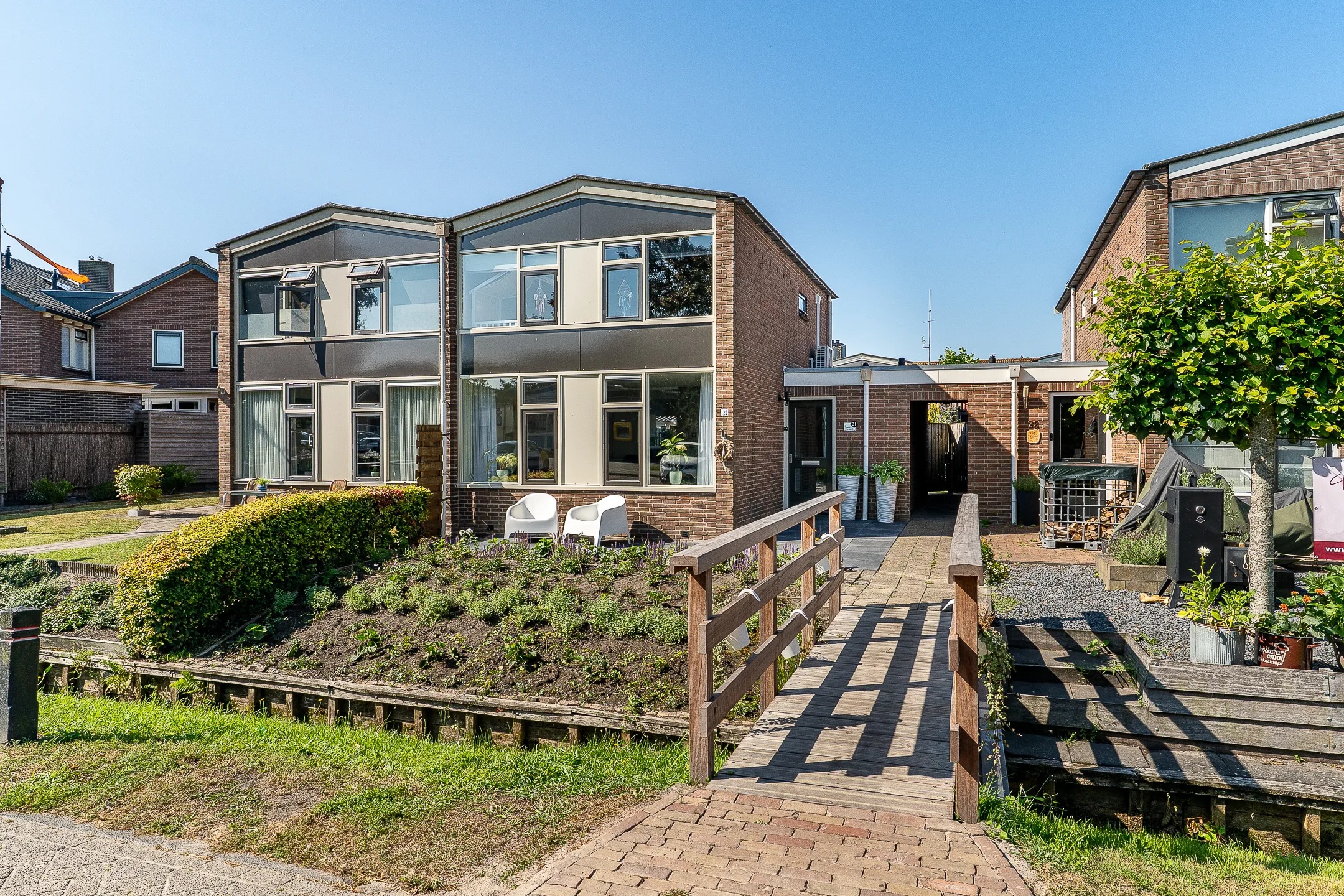 Geschakelde 2-onder-1-kapwoning Veldweg 21 in Doornspijk