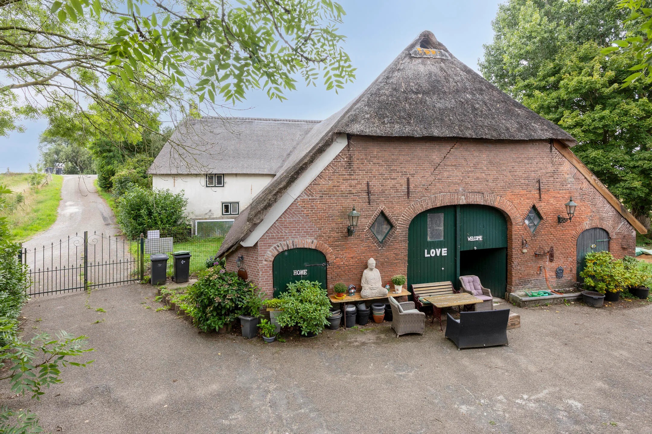 Vrijstaande woning (dijkwoning) Waalbandijk 116 in Dodewaard