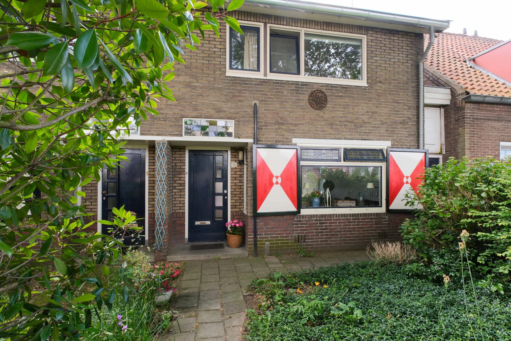 2-onder-1-kapwoning Sluiskade Zuidzijde 59 in Almelo
