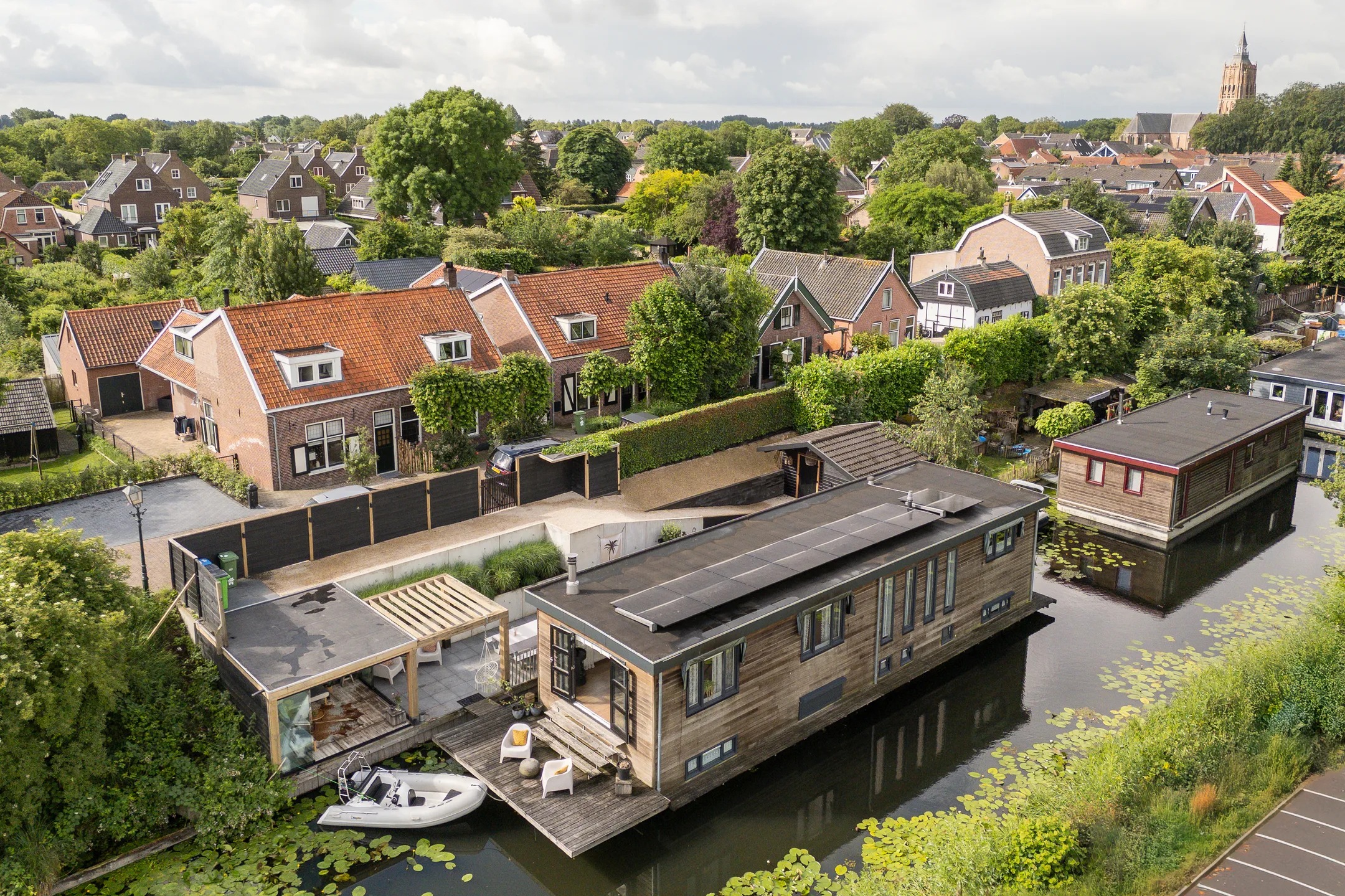 Vrijstaande woning (waterwoning) Molenwal 21 a in Asperen