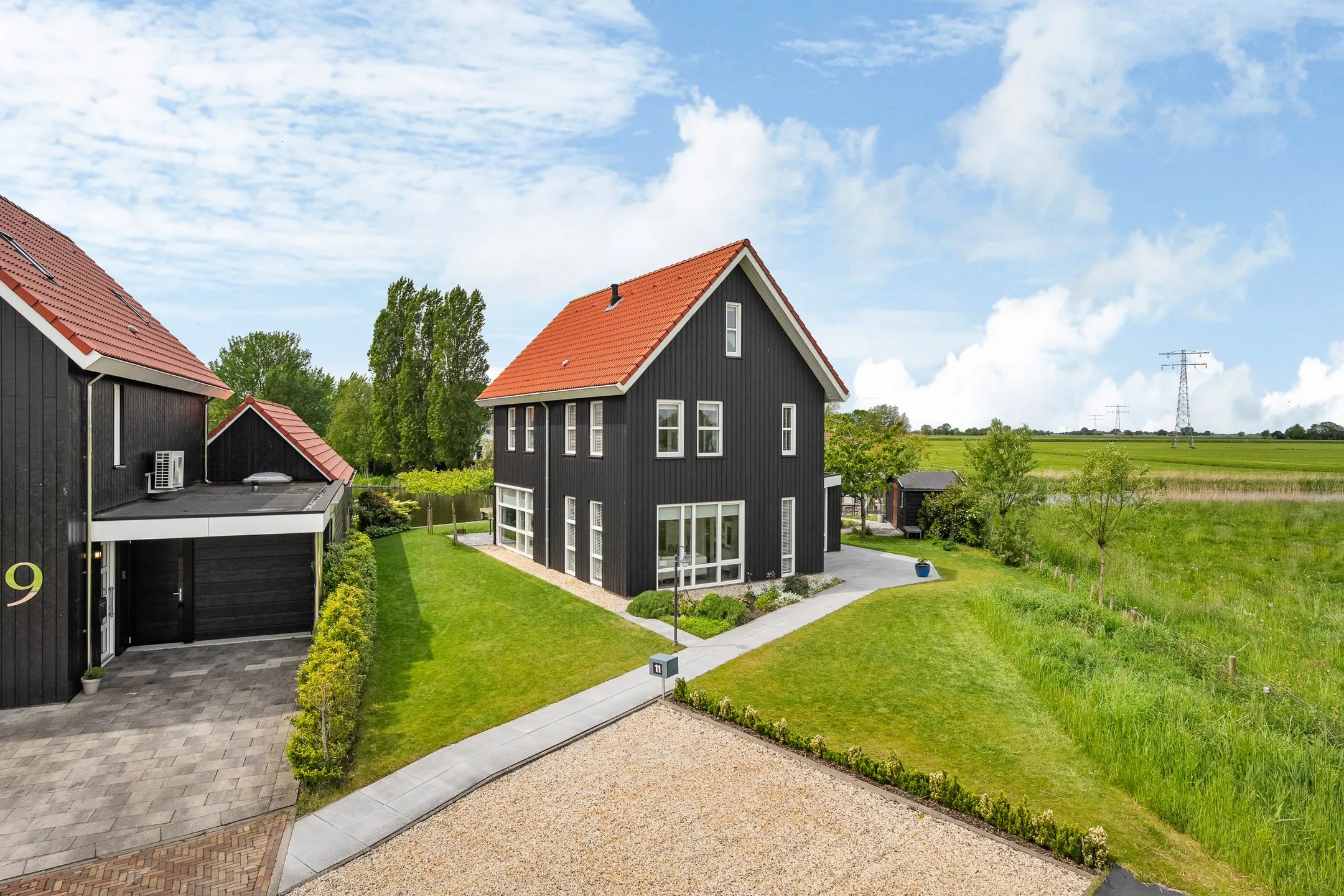 Vrijstaande woning (waterwoning) Tolhûsdyk 11 Sneek