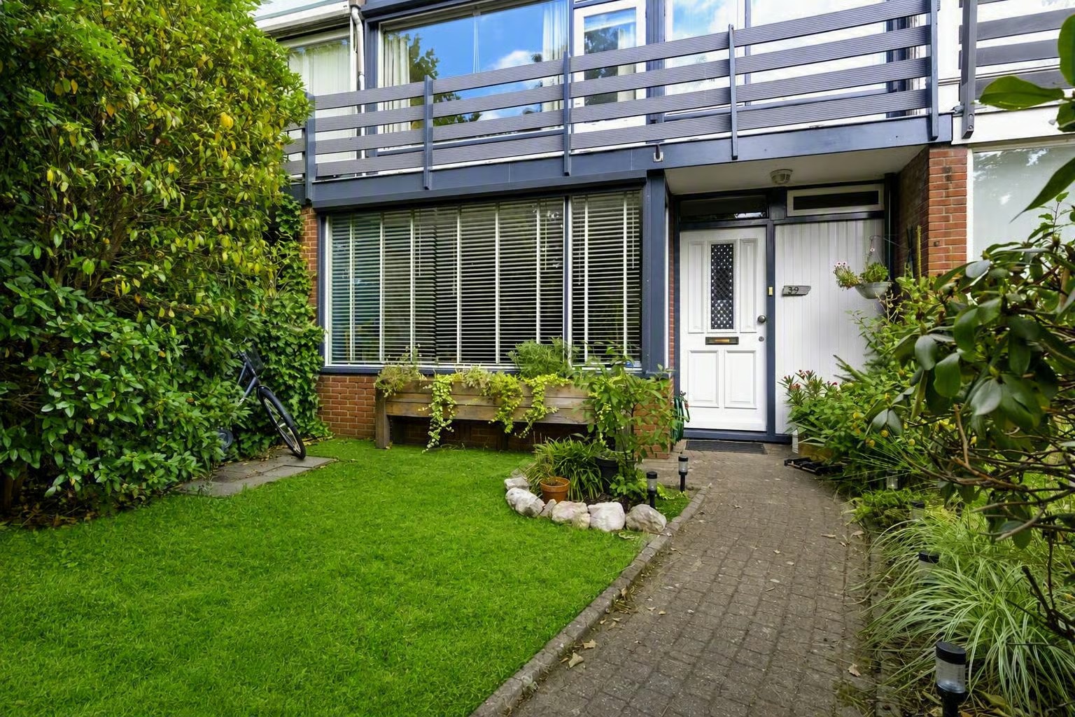Tussenwoning Gemeenlandslaan 39 Huizen